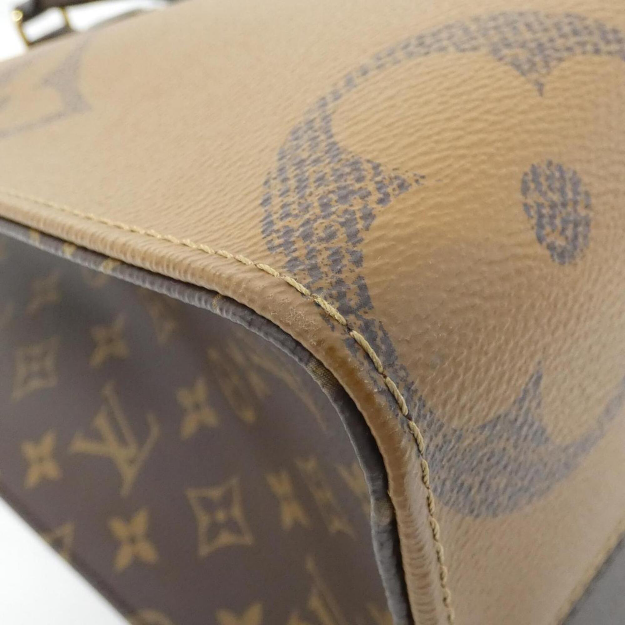 Louis Vuitton Brown Coated Canvas Handbag (Pre-Owned)