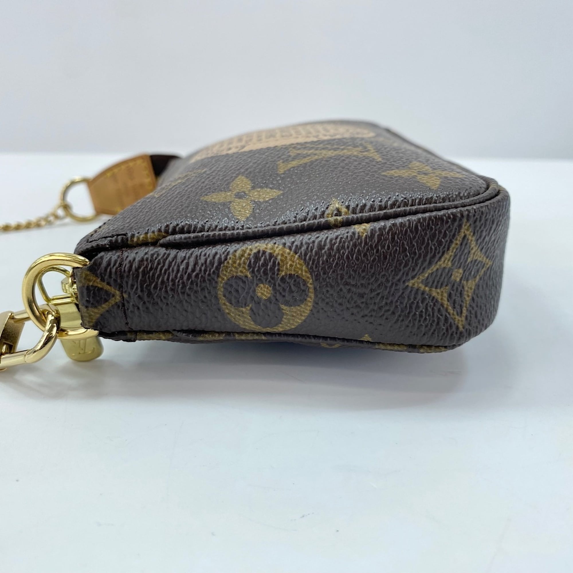 Louis Vuitton Brown Handbag Pochette (Pre-Owned)