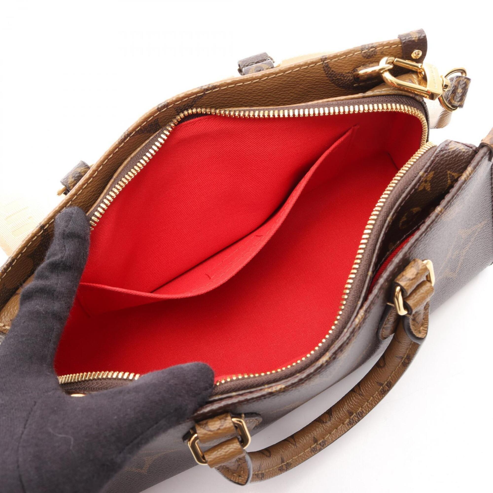 Louis Vuitton Brown Coated Canvas Handbag Pouch (Pre-Owned)