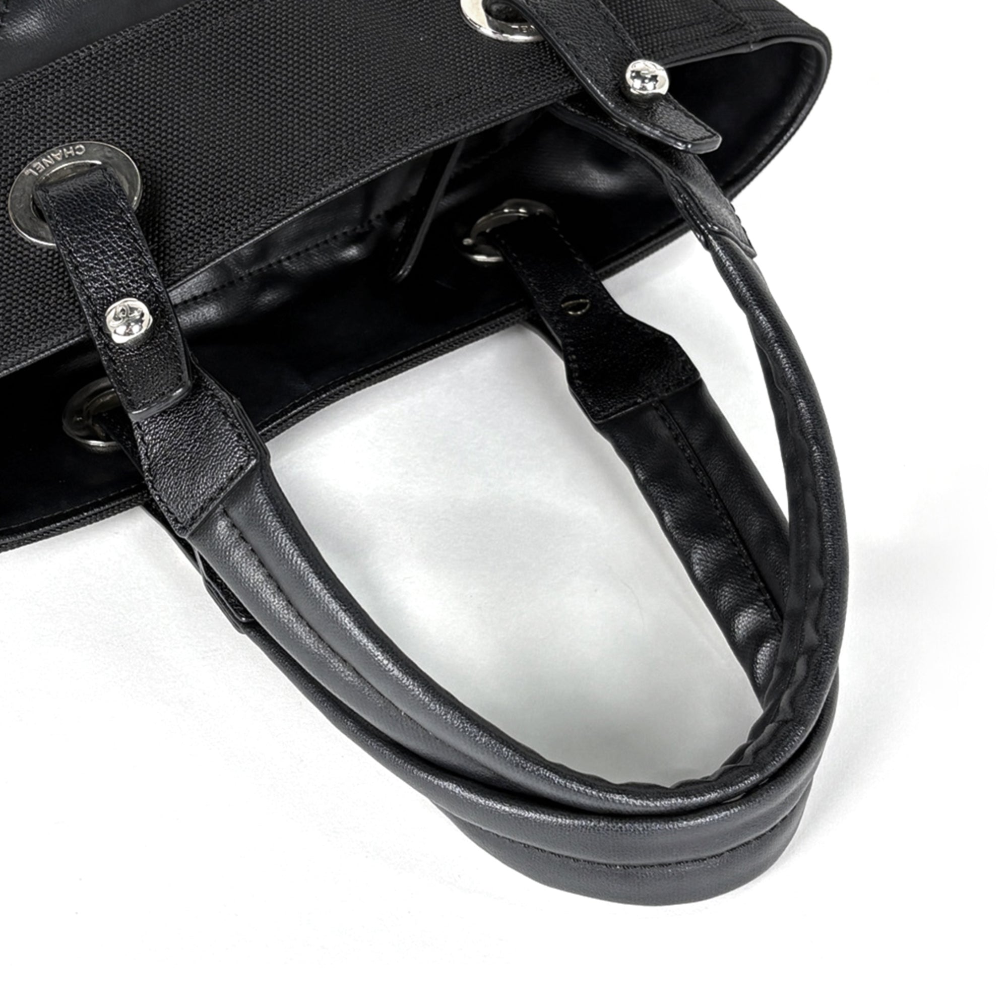 Chanel Black Coated Canvas Handbag (Pre-Owned)
