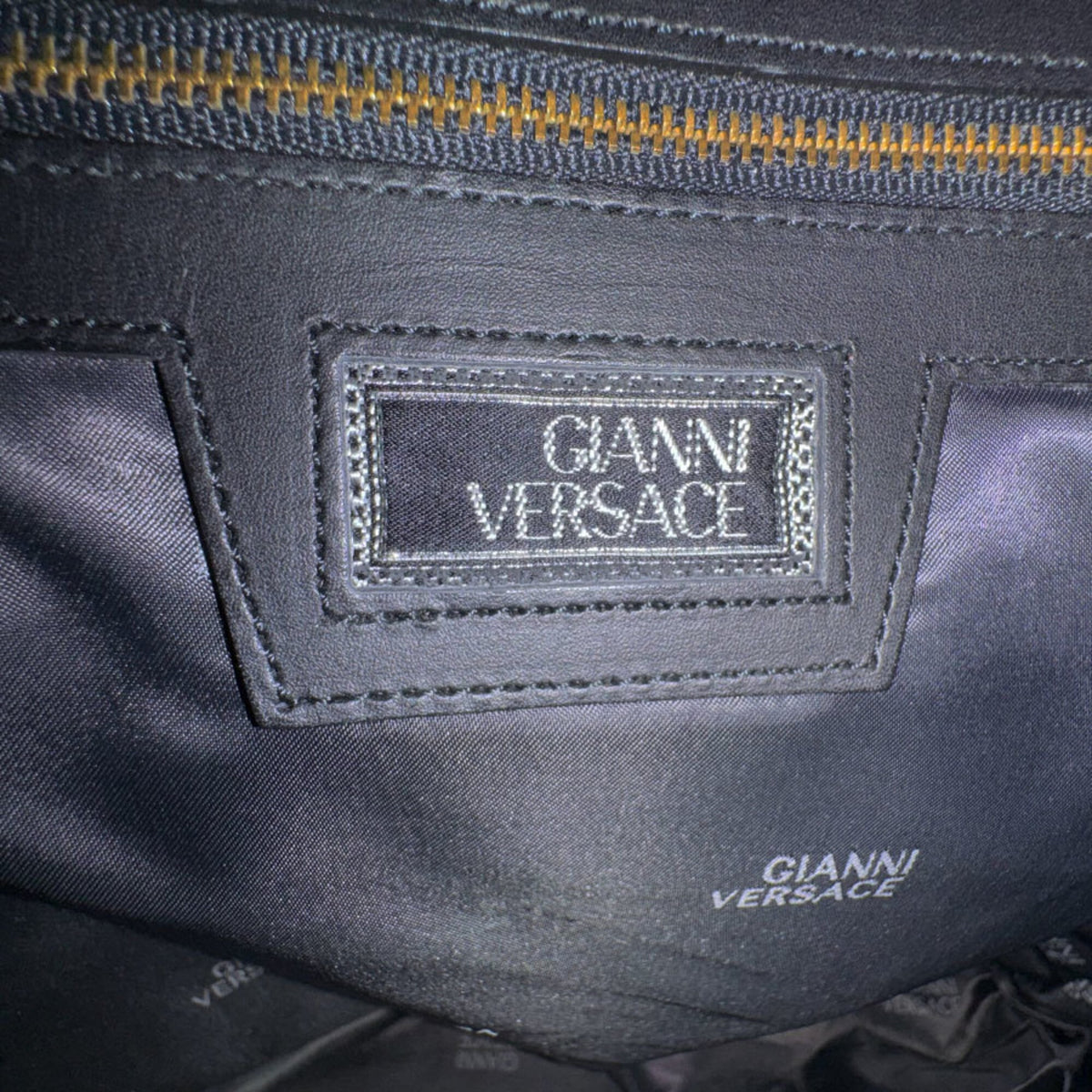 Versace Black Gold Pvc Backpack (Pre-Owned)
