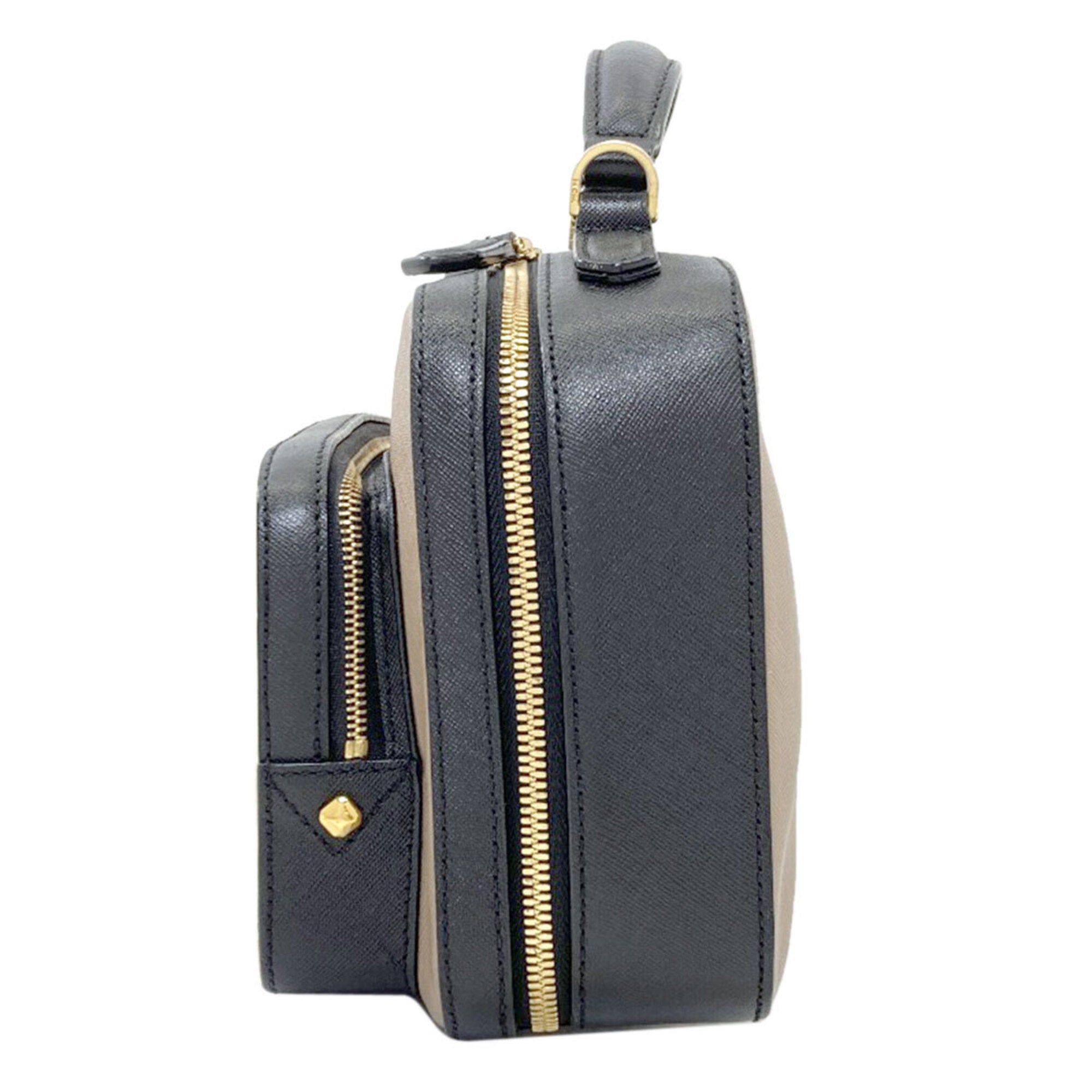 Mcm Black Brown White Pvc Handbag (Pre-Owned)