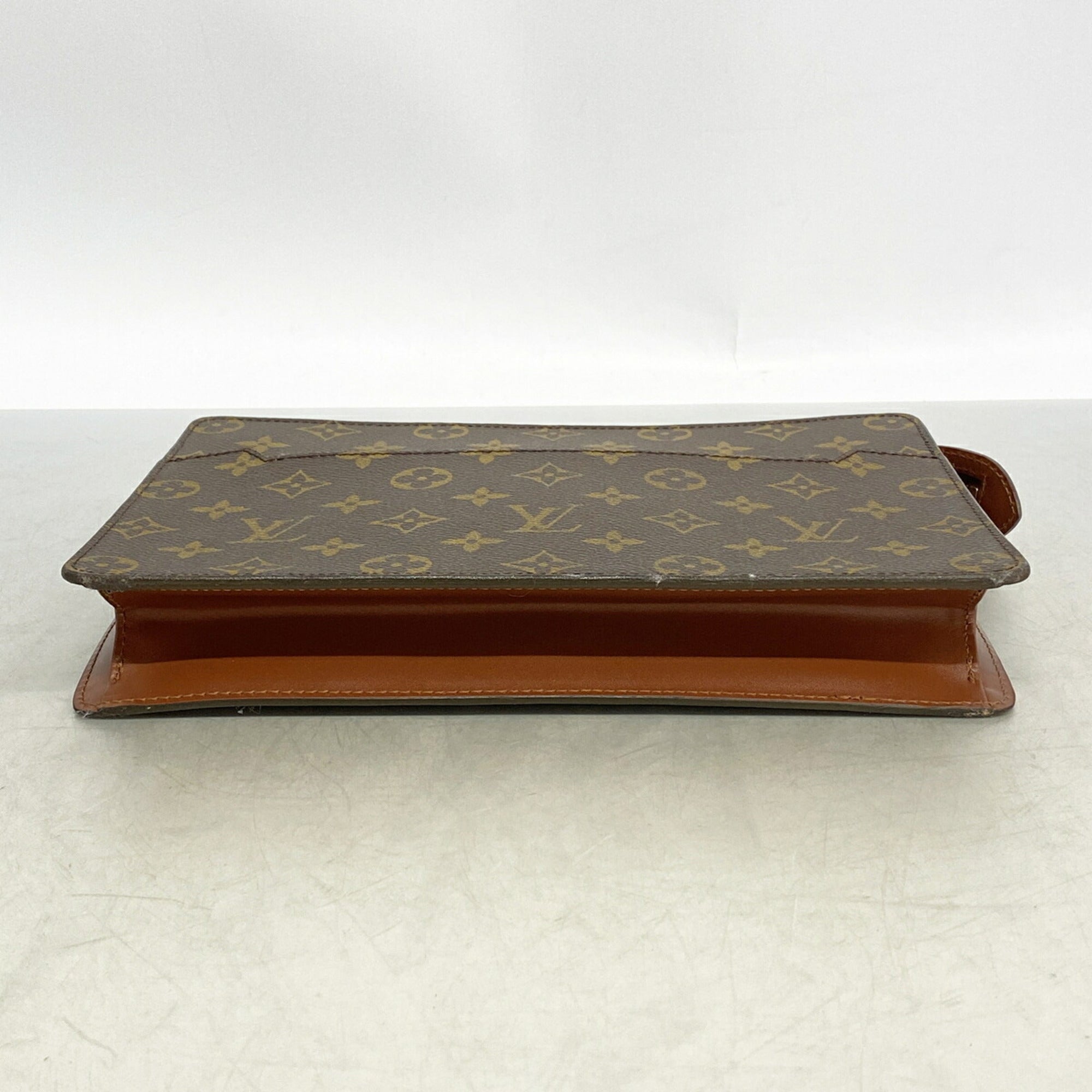 Louis Vuitton Brown Clutch Bag (Pre-Owned)