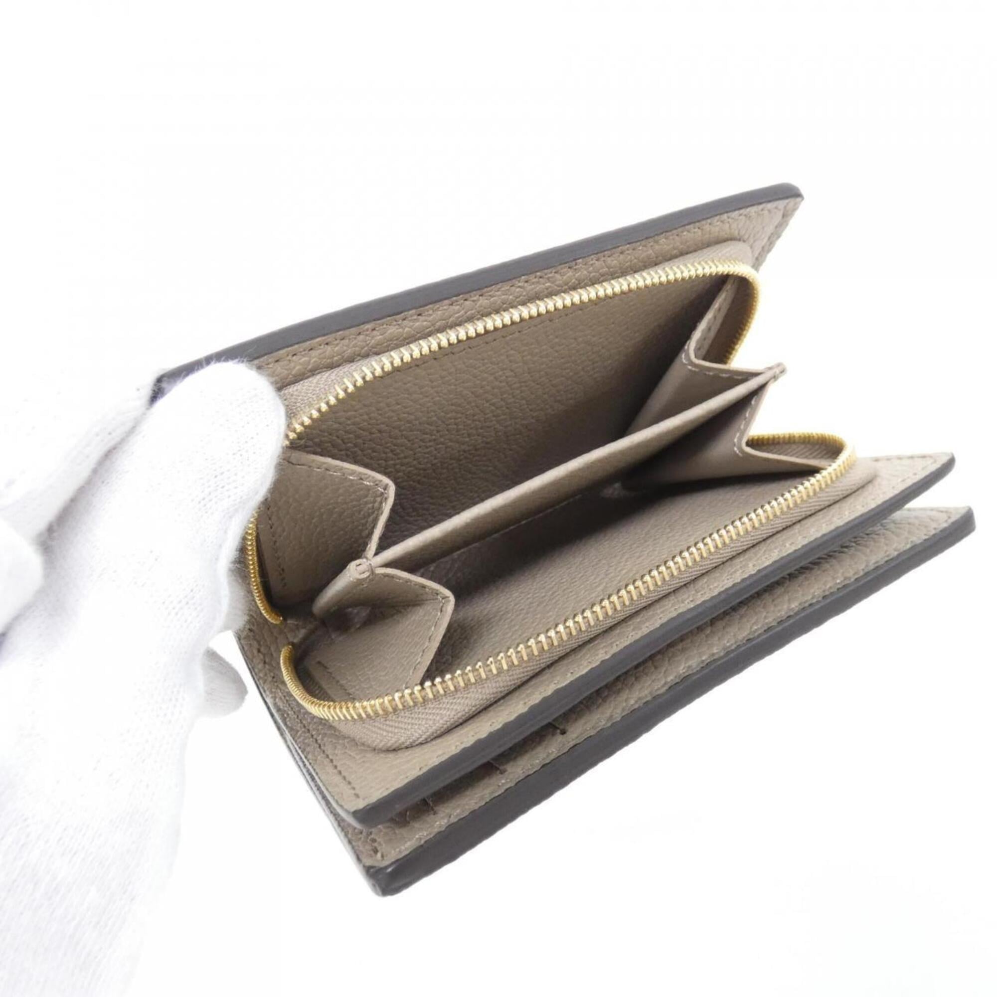 Louis Vuitton Tourterelle Leather Wallet (Bi-Fold) (Pre-Owned)