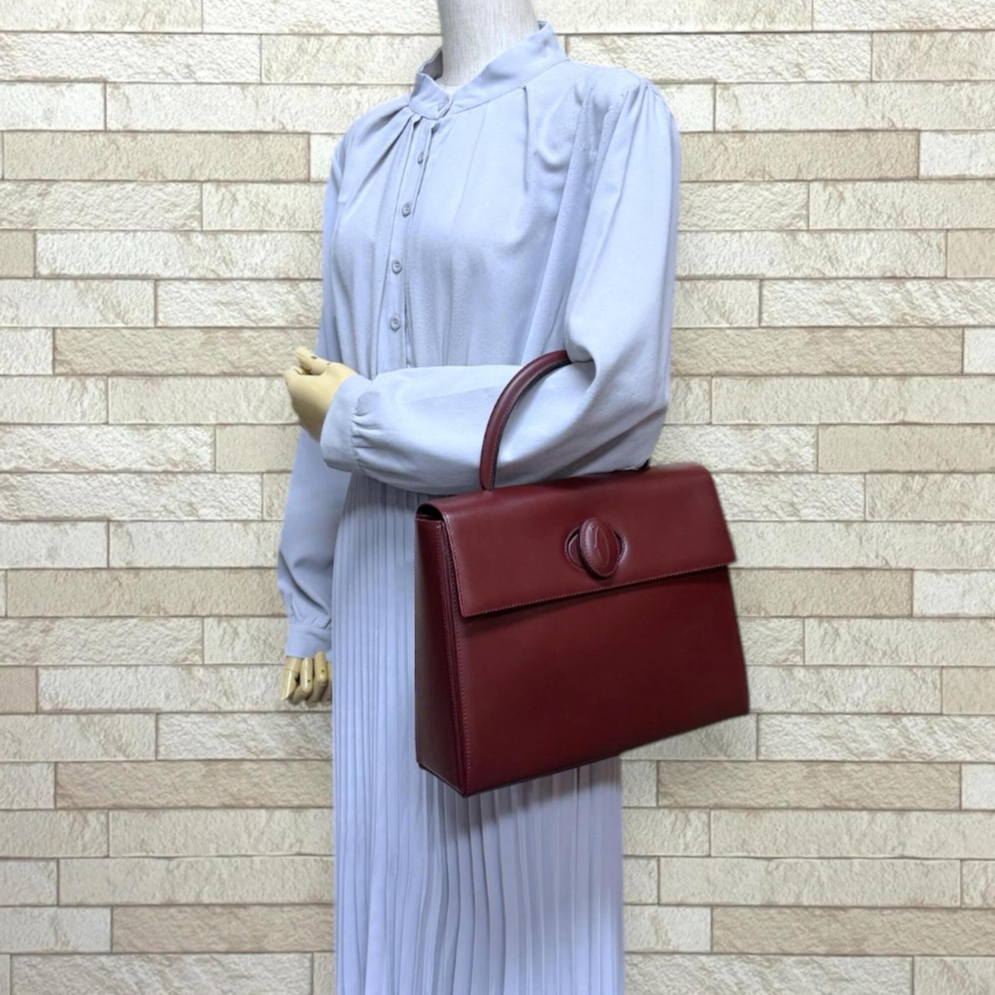 Cartier Bordeaux Red Color Leather Handbag (Pre-Owned)