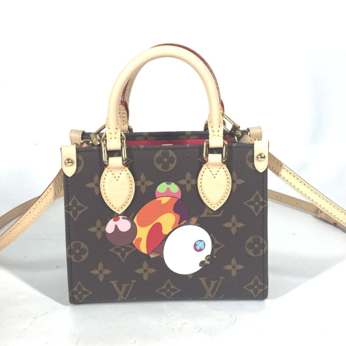 Louis Vuitton Brown Monogram Canvas Handbag (Pre-Owned)