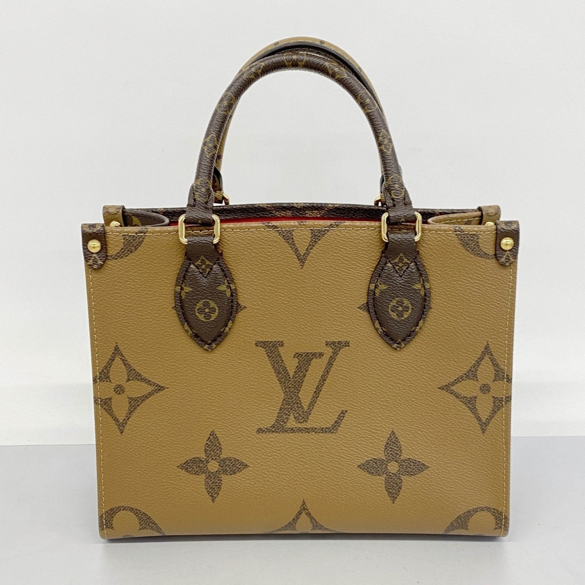 Louis Vuitton Brown Handbag (Pre-Owned)