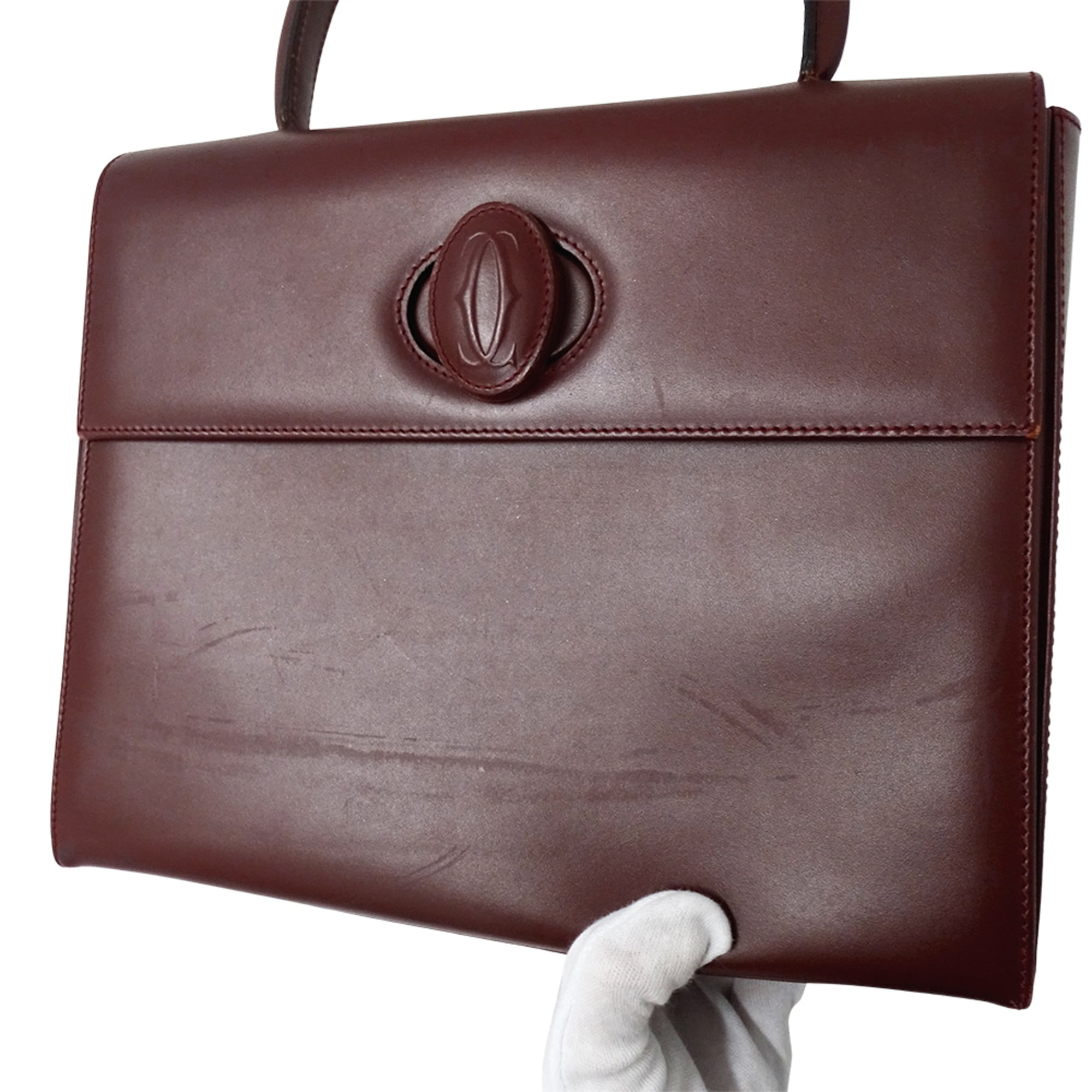 Cartier Bordeaux Red Color Wine Red Leather Handbag (Pre-Owned)