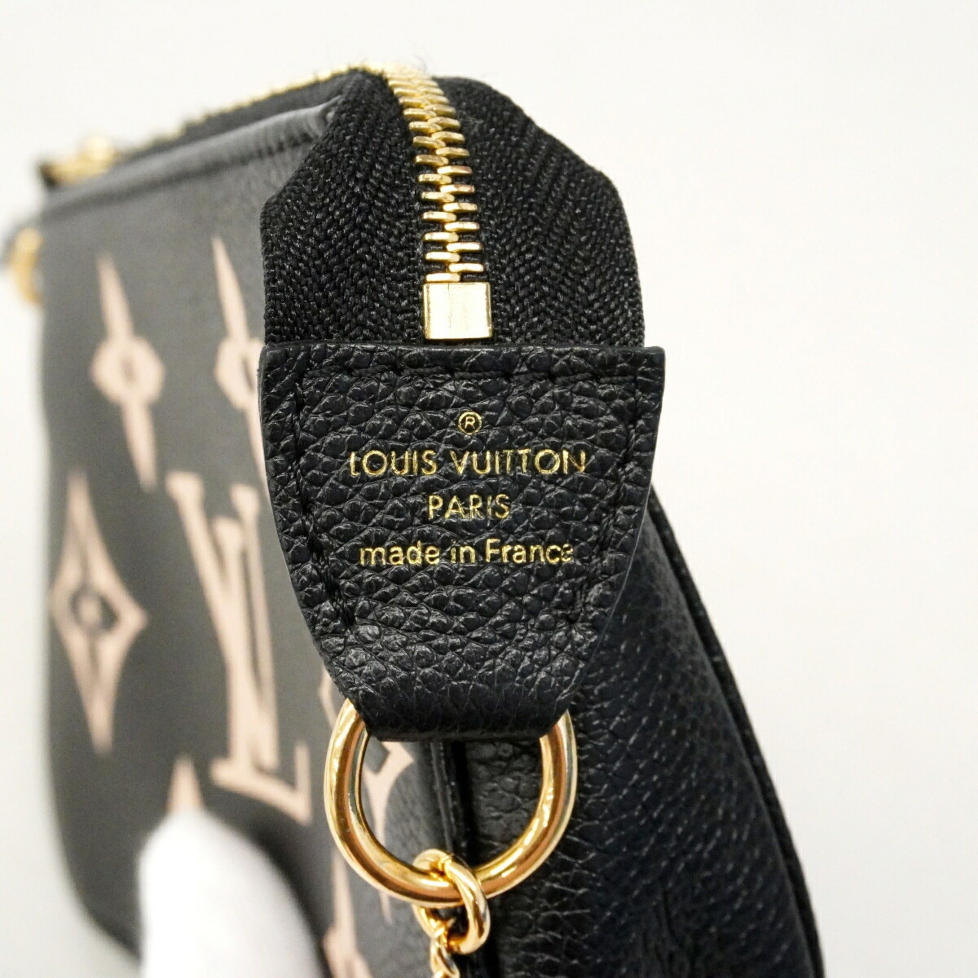 Louis Vuitton Cream Noir Pouch (Pre-Owned)