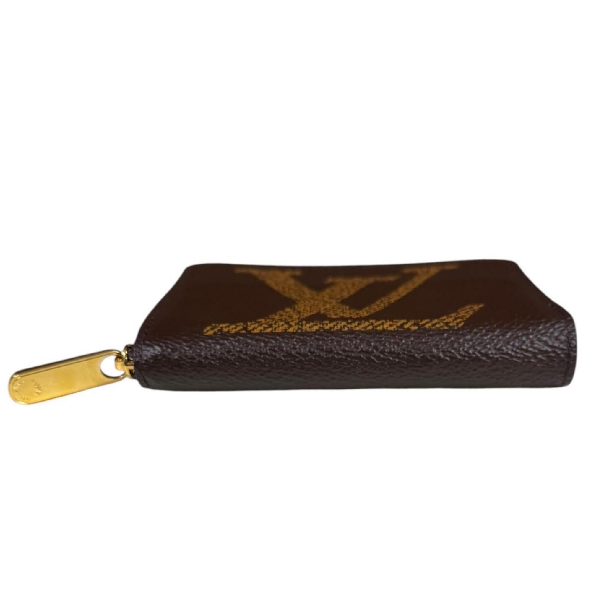 Louis Vuitton Brown Monogram Coin Purse/Coin Case (Pre-Owned)