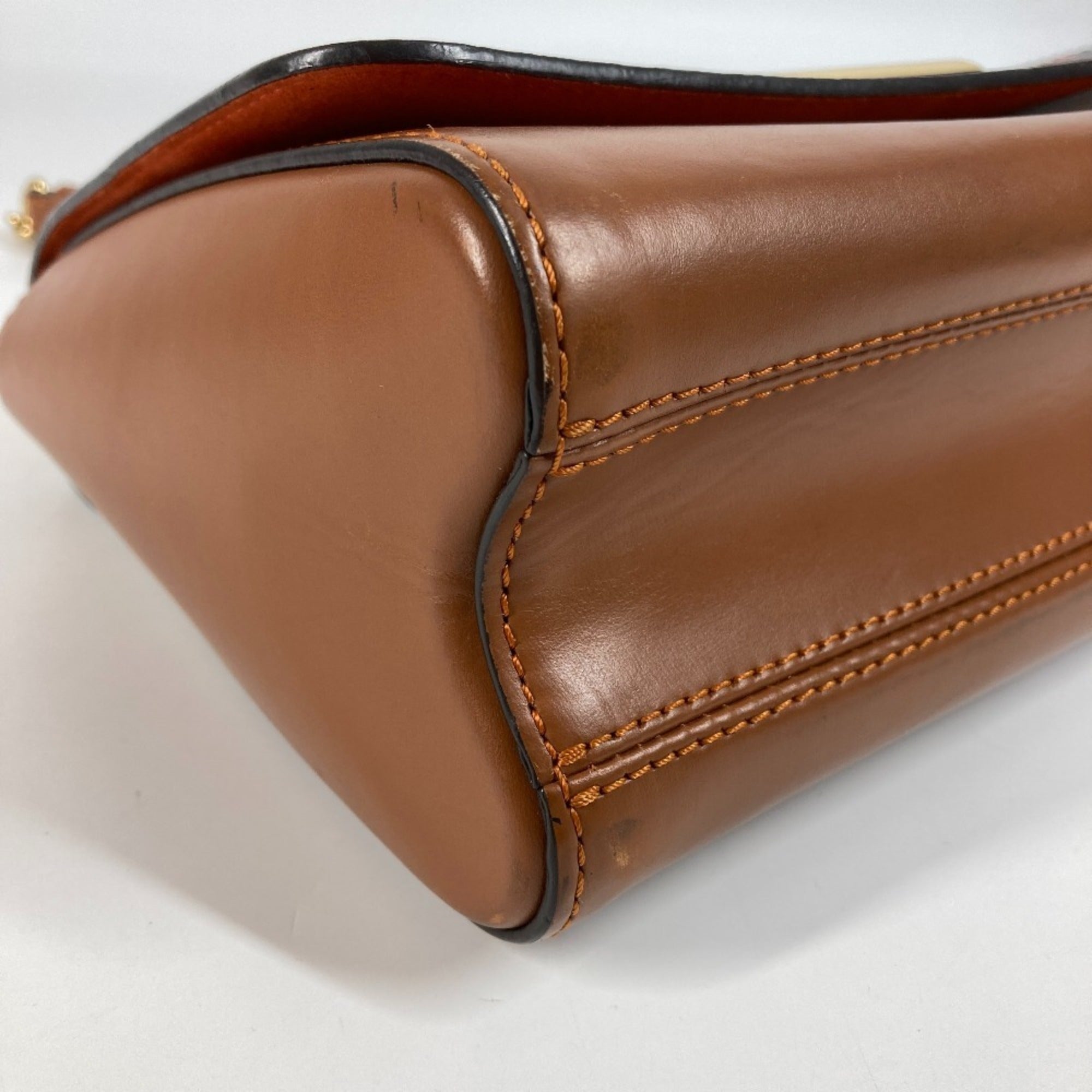 Louis Vuitton Brown Orange Monogram Leather Shoulder Bag (Pre-Owned)