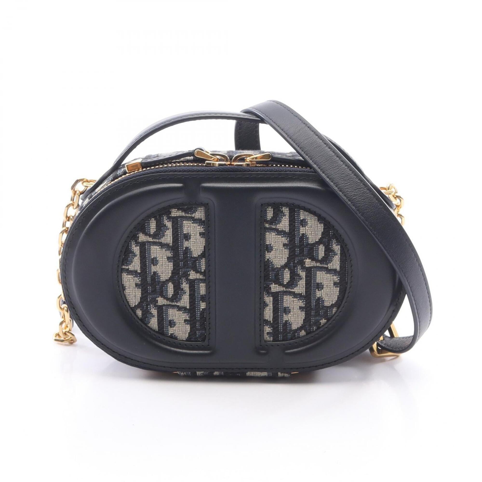 Christian Dior Ivory Navy Leather Canvas Handbag (Pre-Owned)