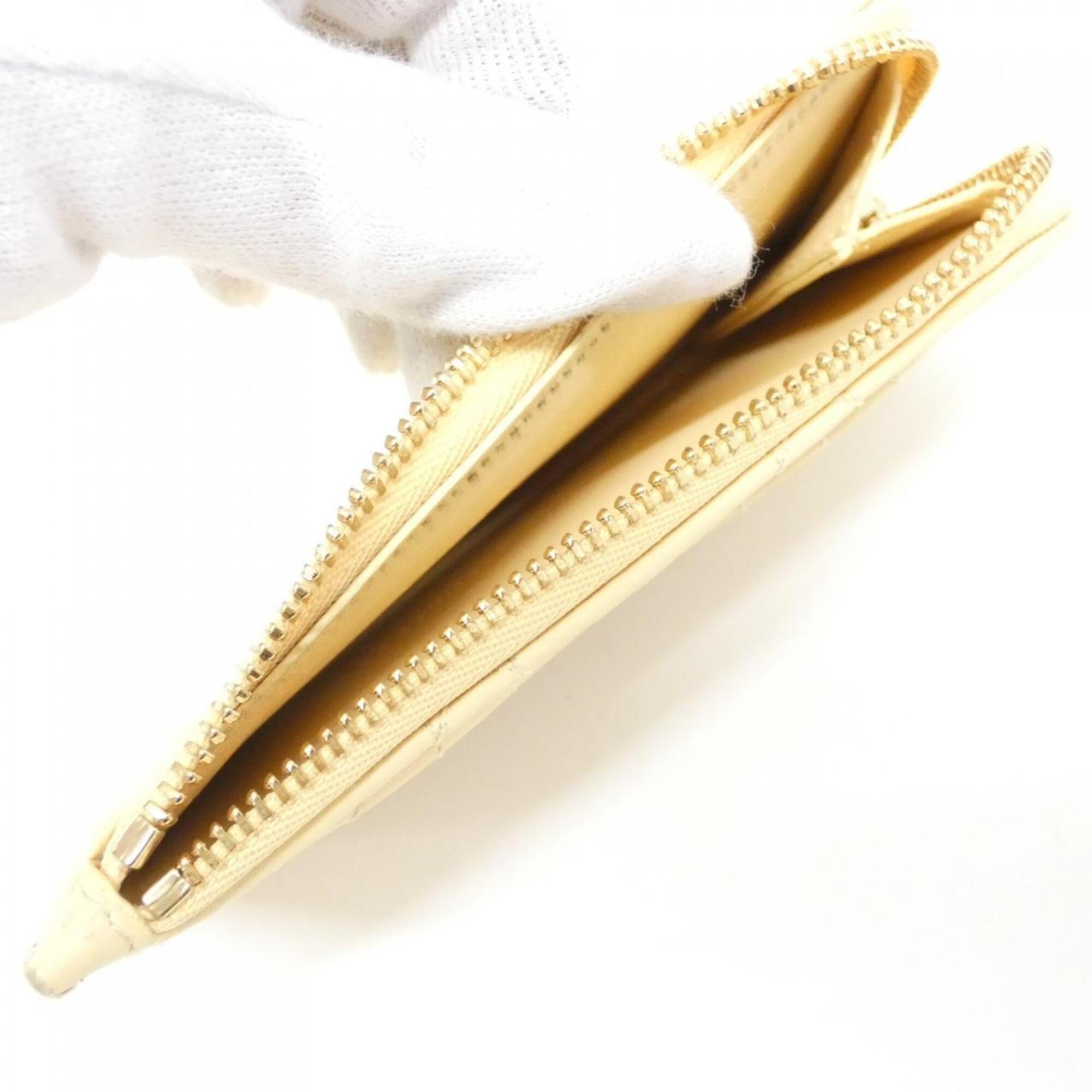 Christian Dior Pale Yellow Leather Coin Purse/Coin Case (Pre-Owned)