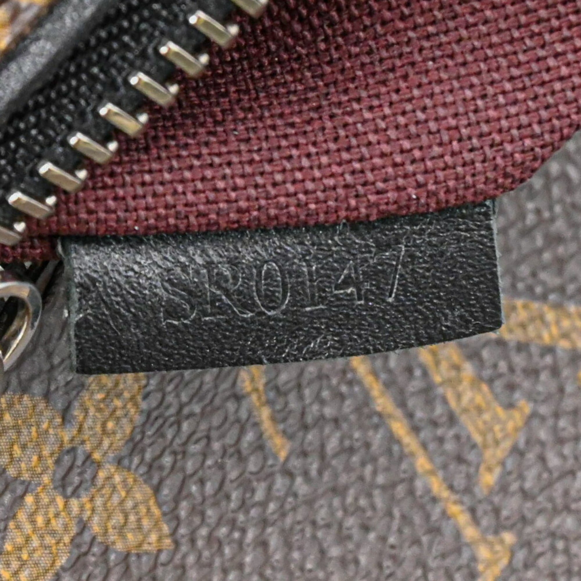 Louis Vuitton Black Brown Leather Backpack (Pre-Owned)