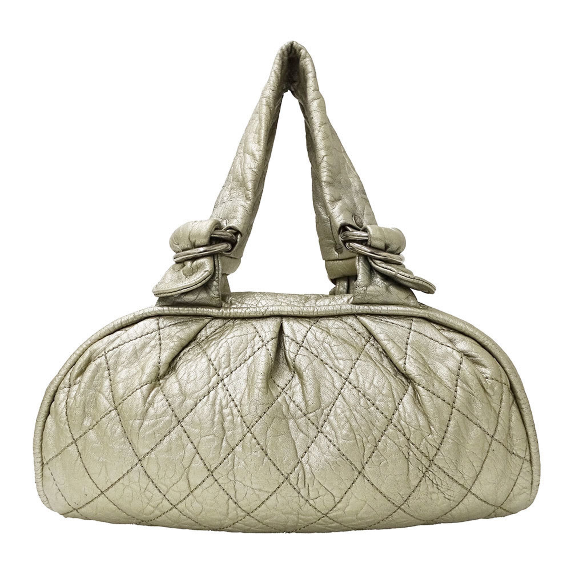 Chanel Champagne Gold Leather Handbag (Pre-Owned)