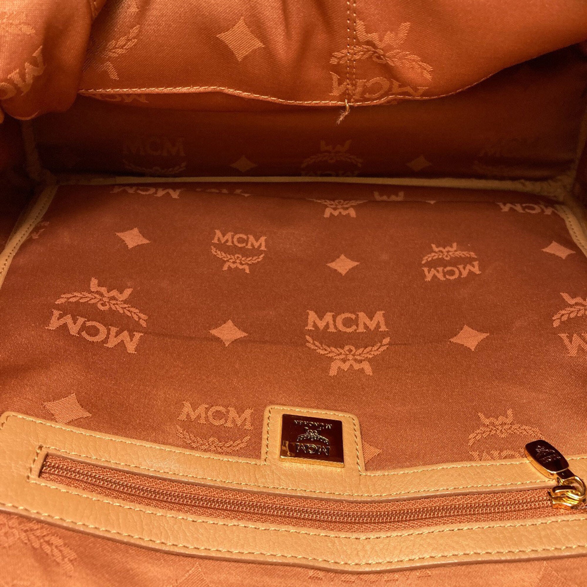 Mcm Brown Pvc Backpack (Pre-Owned)