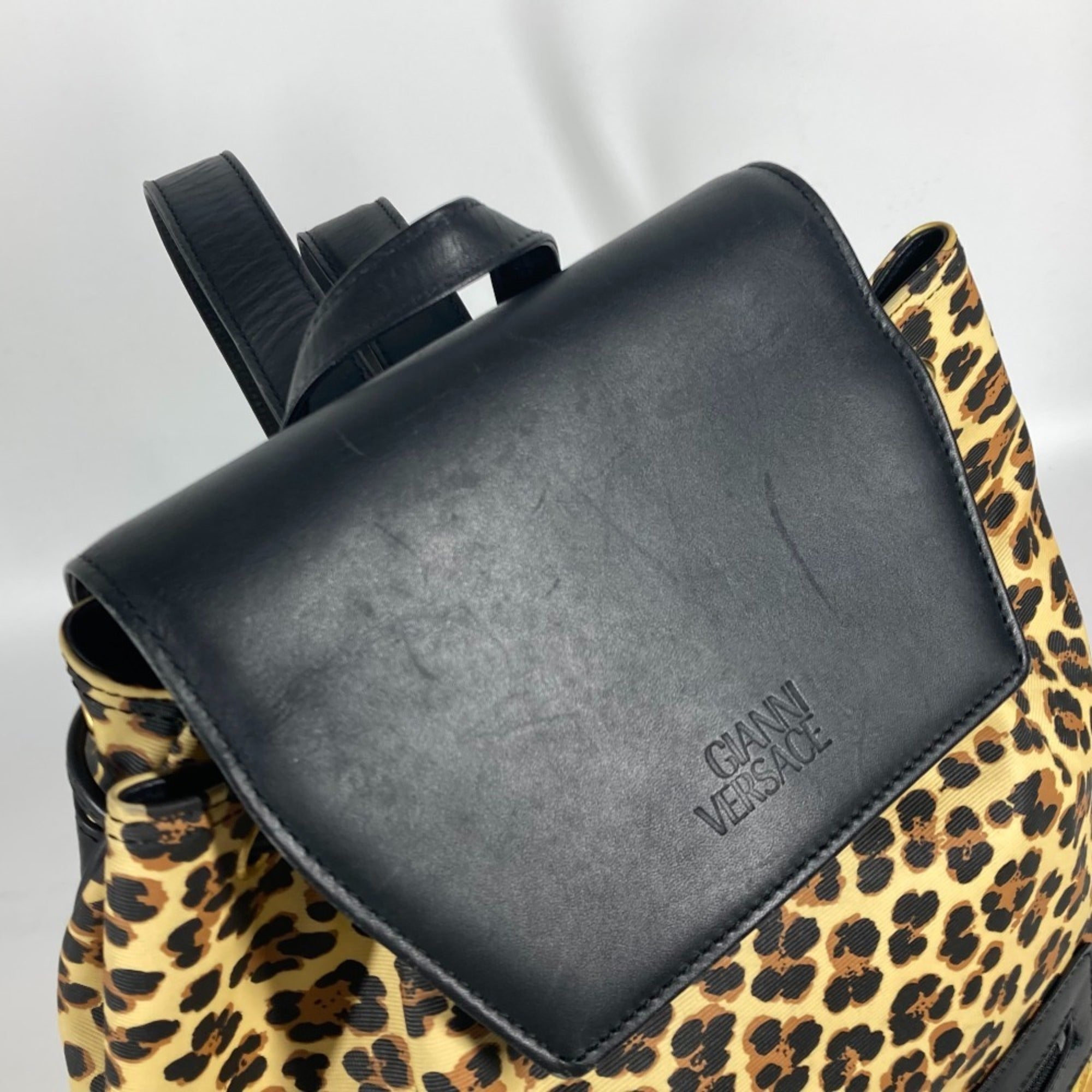 Versace Black Yellow Pvc Leather Backpack (Pre-Owned)
