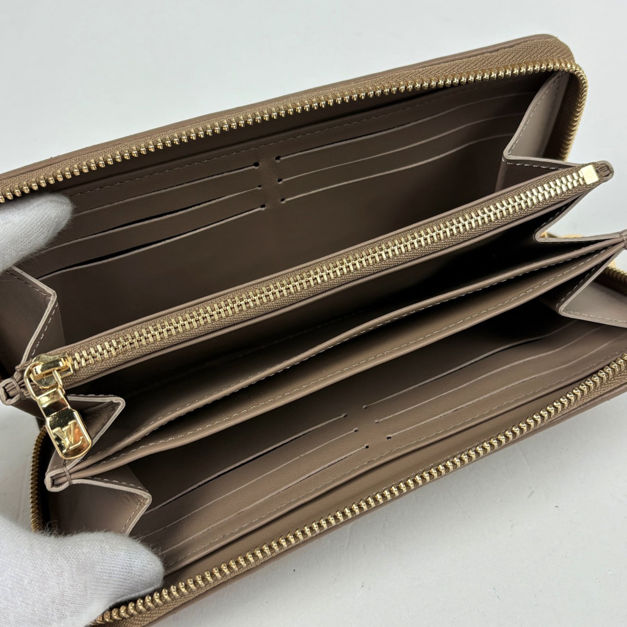 Louis Vuitton Monogram Taupe Leather Long Wallet (Bi-Fold) (Pre-Owned)