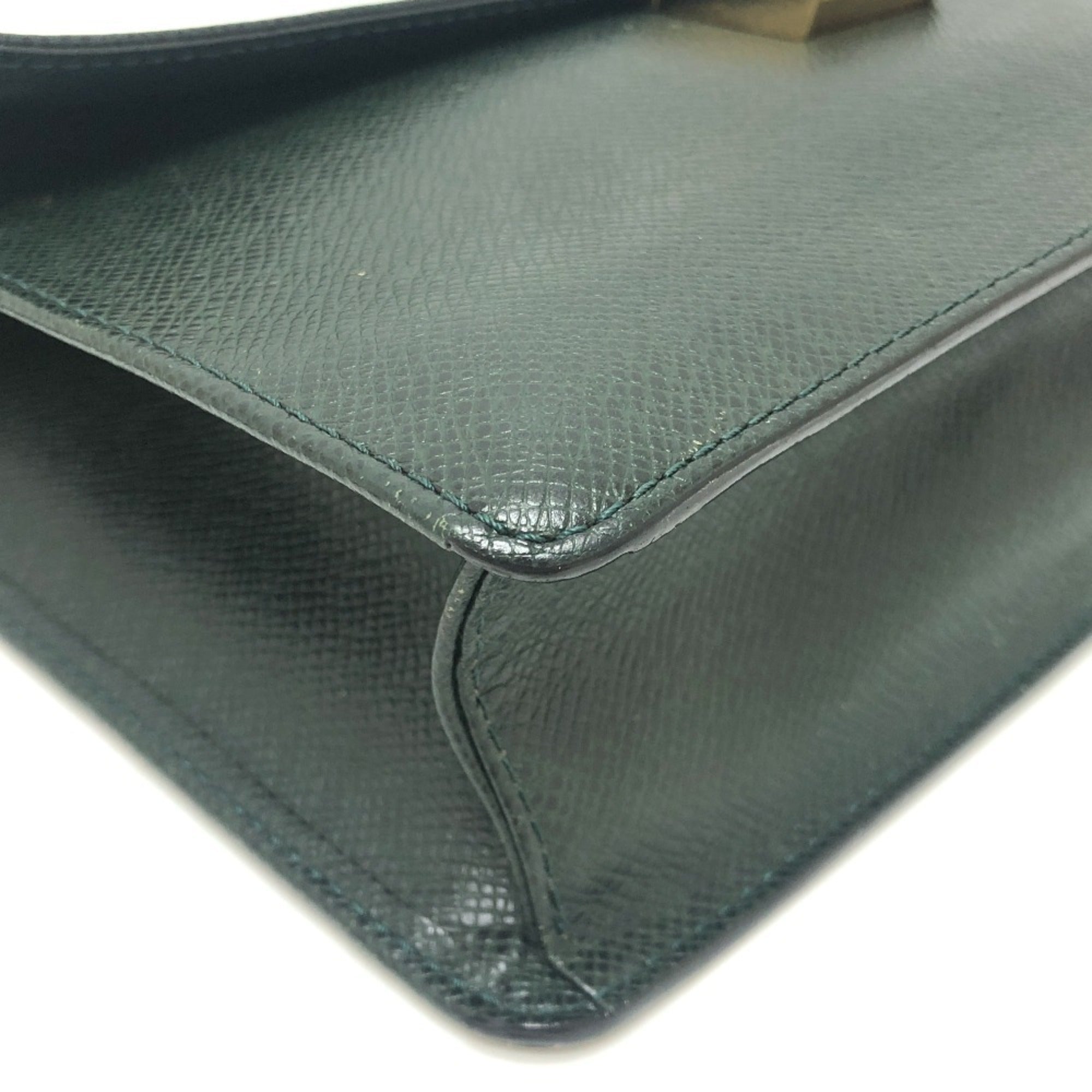 Louis Vuitton Episea Leather Taiga Leather Clutch Bag (Pre-Owned)