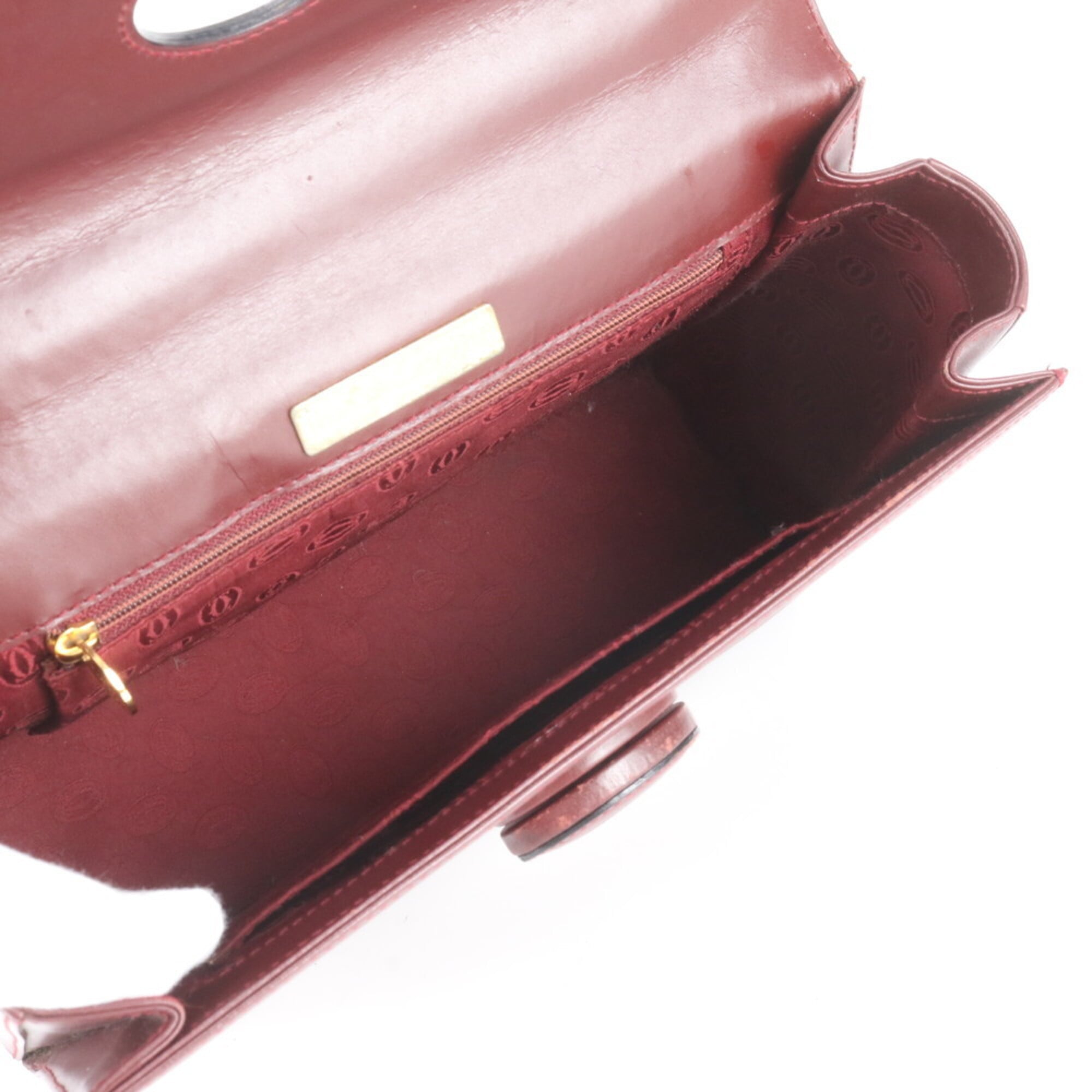 Cartier Wine Red Leather Handbag (Pre-Owned)