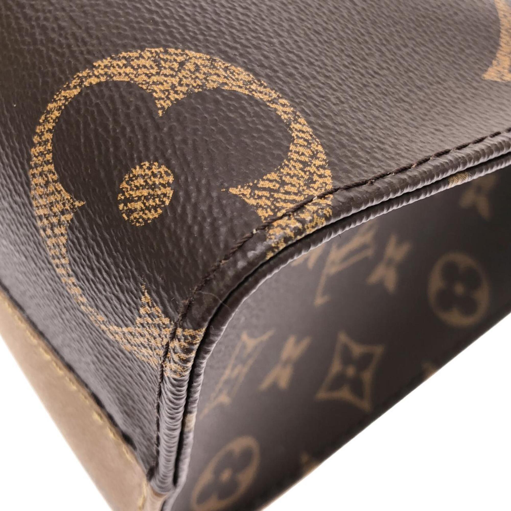 Louis Vuitton Brown Coated Canvas Handbag (Pre-Owned)
