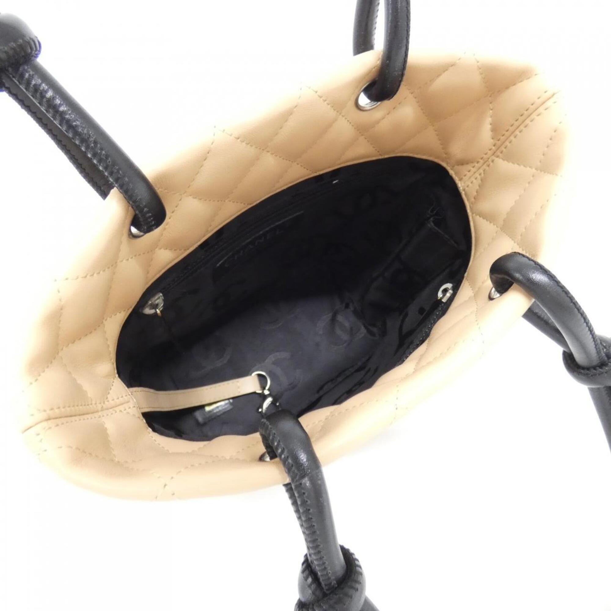 Chanel Beige Black Leather Handbag (Pre-Owned)