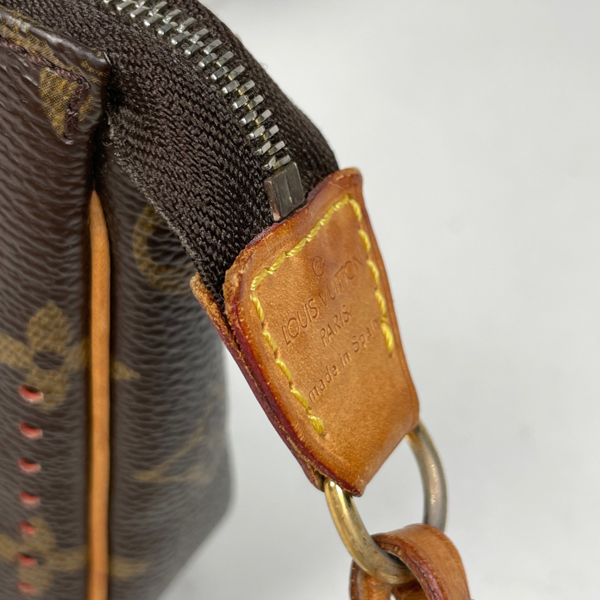 Louis Vuitton Monogram Perfo Lv Orange Orange Monogram Perforated Handbag Pochette (Pre-Owned)