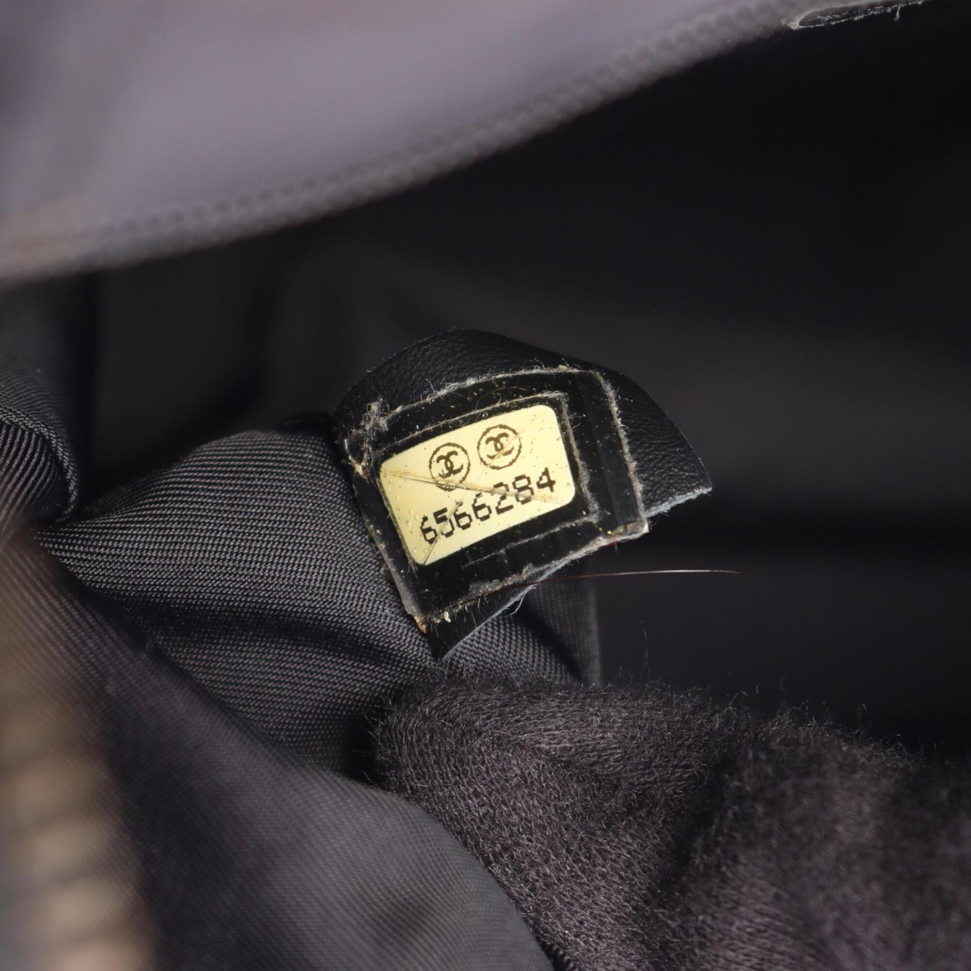 Chanel Black Leather Nylon Canvas Backpack Handbag (Pre-Owned)