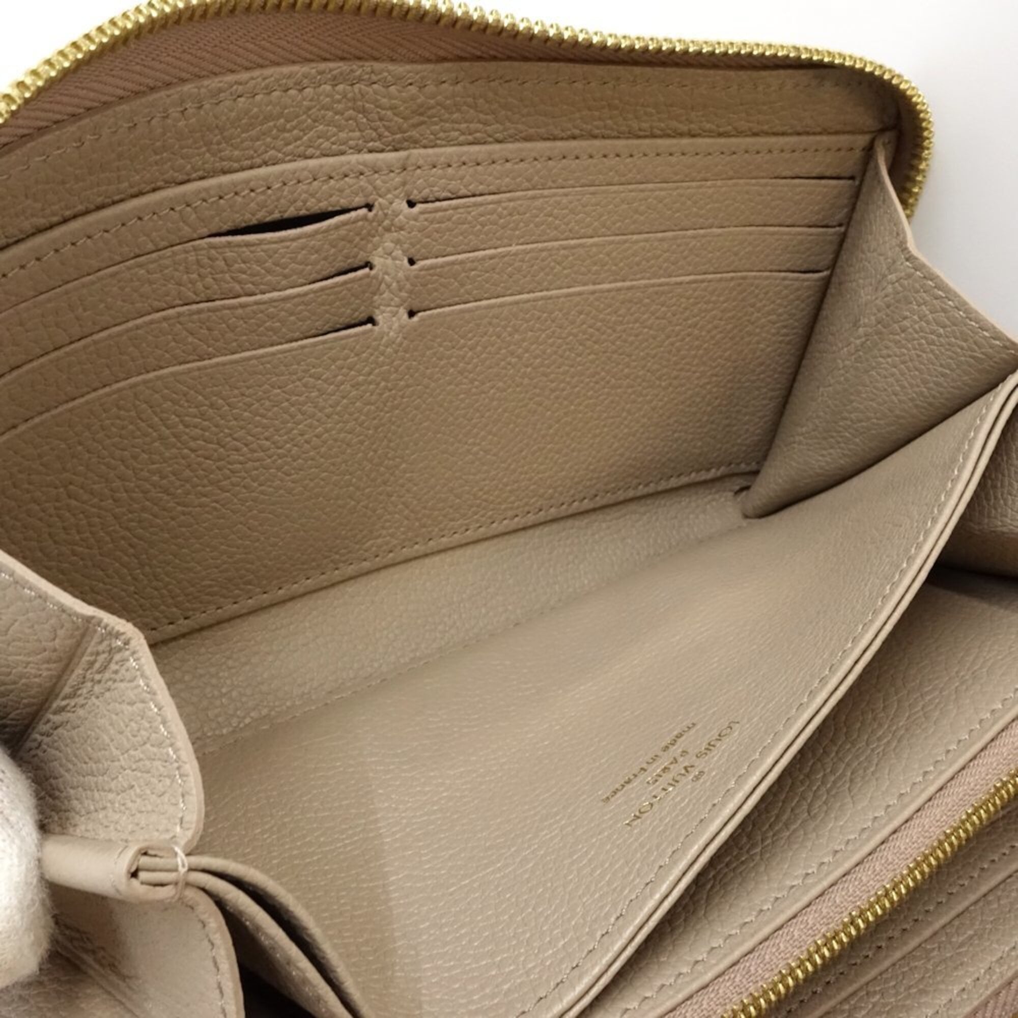 Louis Vuitton Monogram Empreinte Tourterelle Monogram Empreinte Long Wallet (Bi-Fold) (Pre-Owned)