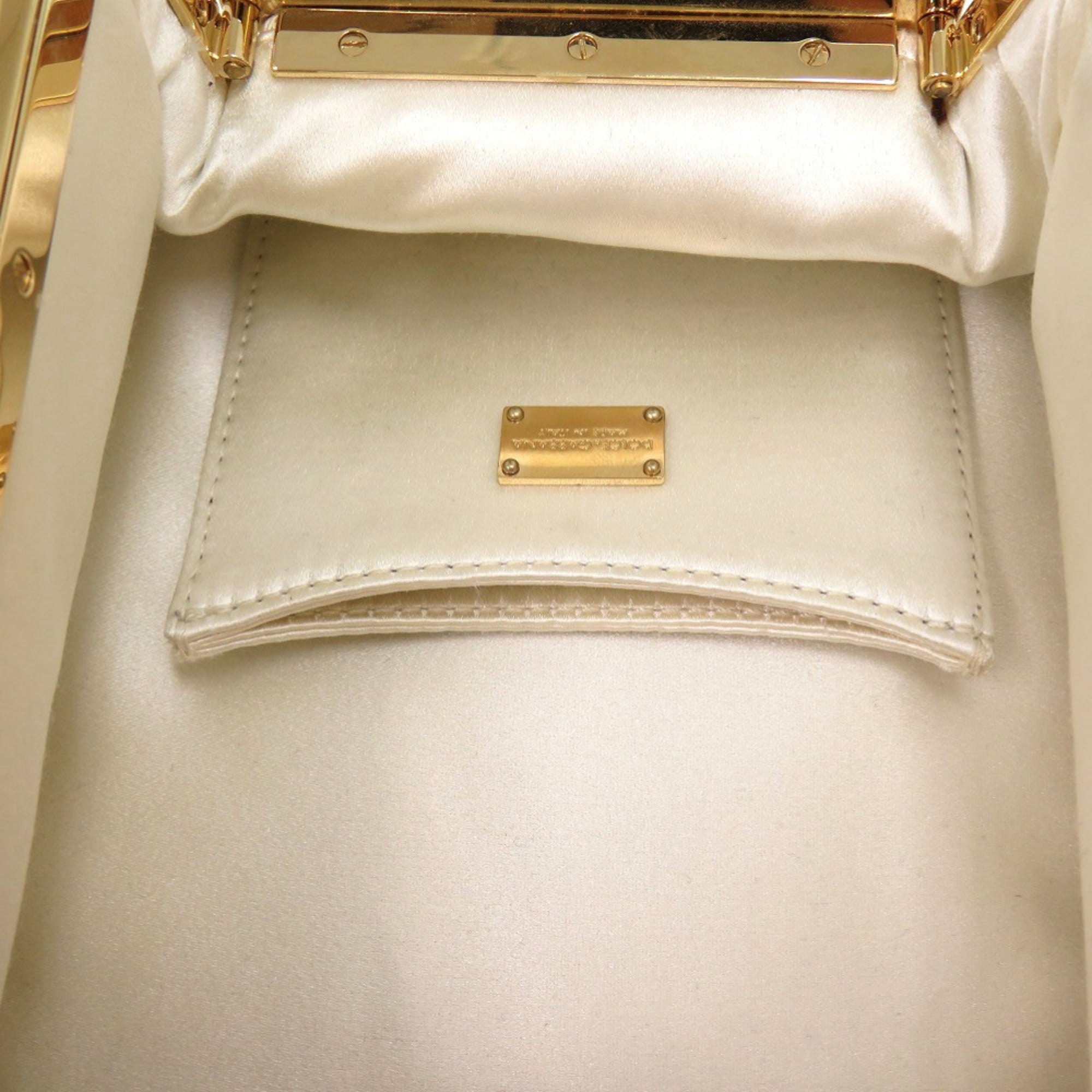 Dolce & Gabbana Off-White Metal Leather Clutch Bag (Pre-Owned)