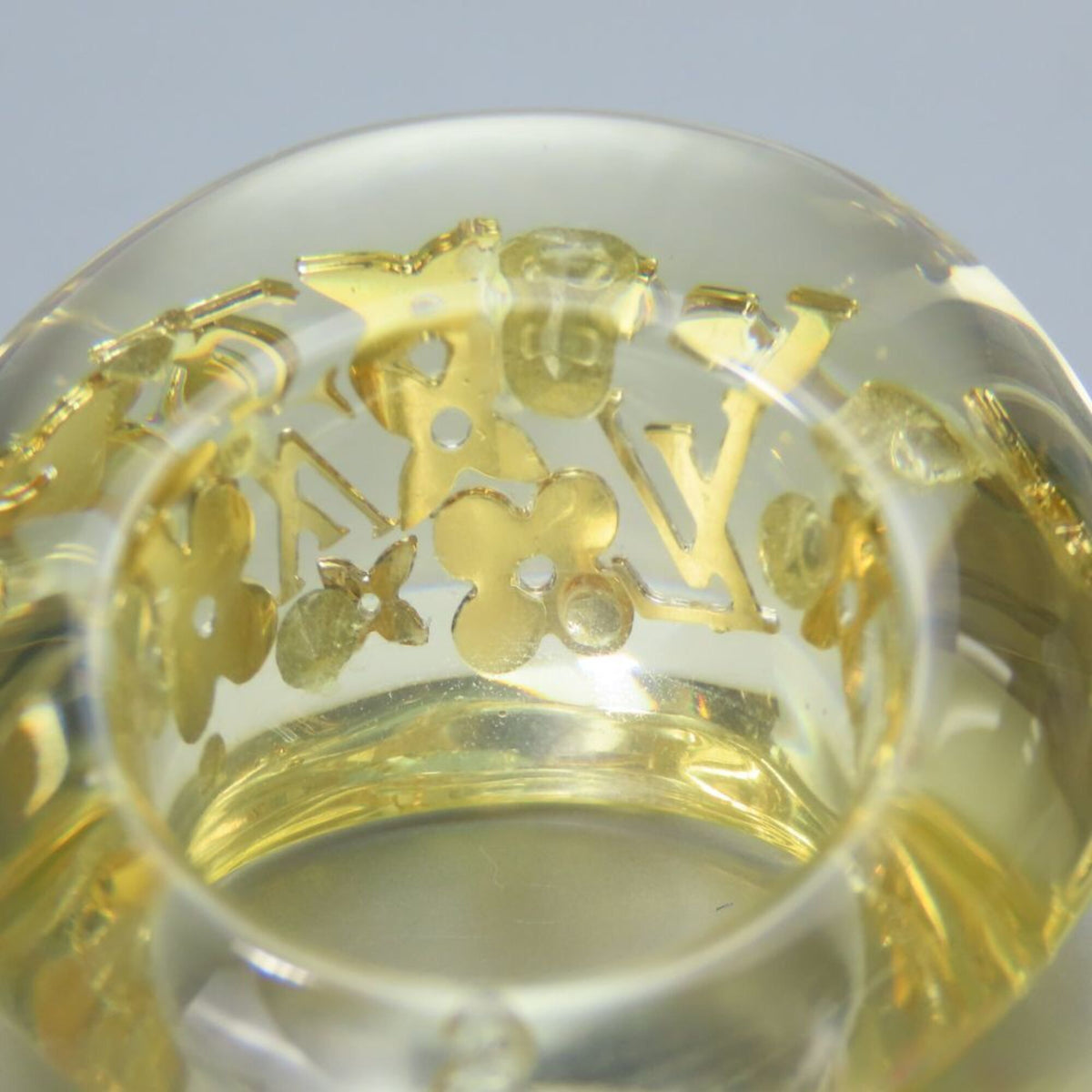 Louis Vuitton Gold Clear Plastic Band Ring (Pre-Owned)