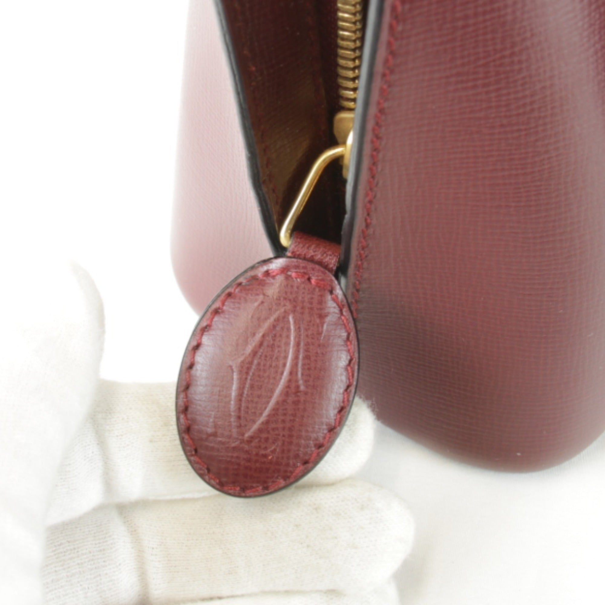 Cartier Must Wine Red Leather Handbag (Pre-Owned)