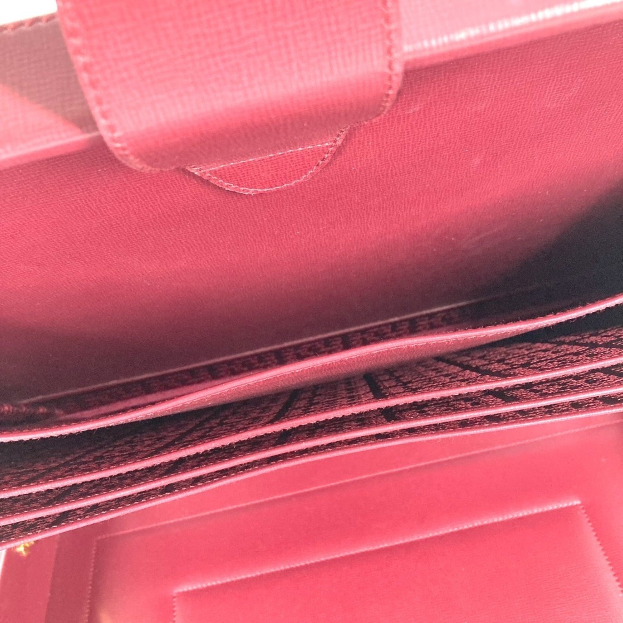 Cartier Wine Red Leather Handbag (Pre-Owned)
