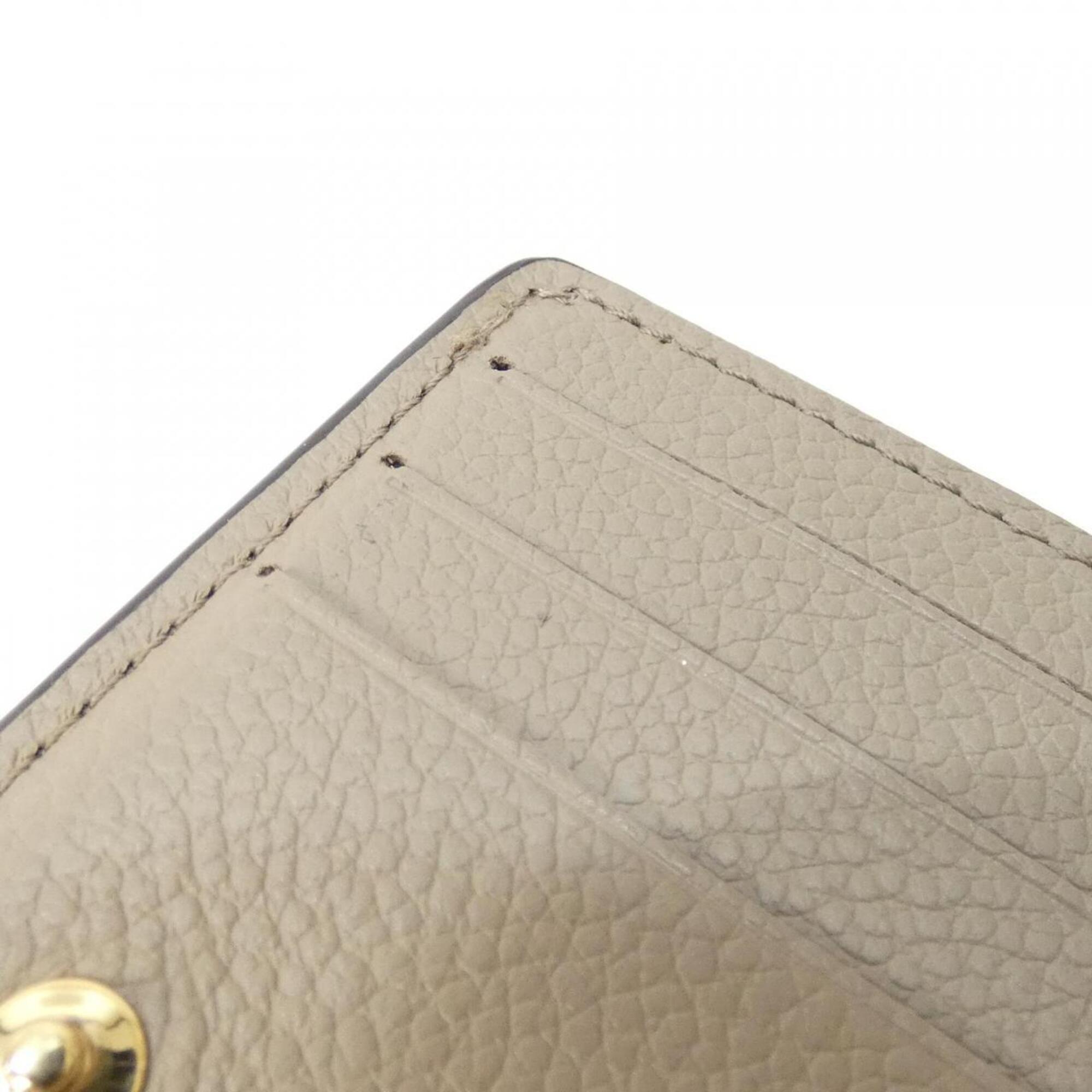 Louis Vuitton Monogram Empreinte Tourterelle Leather Wallet (Bi-Fold) (Pre-Owned)
