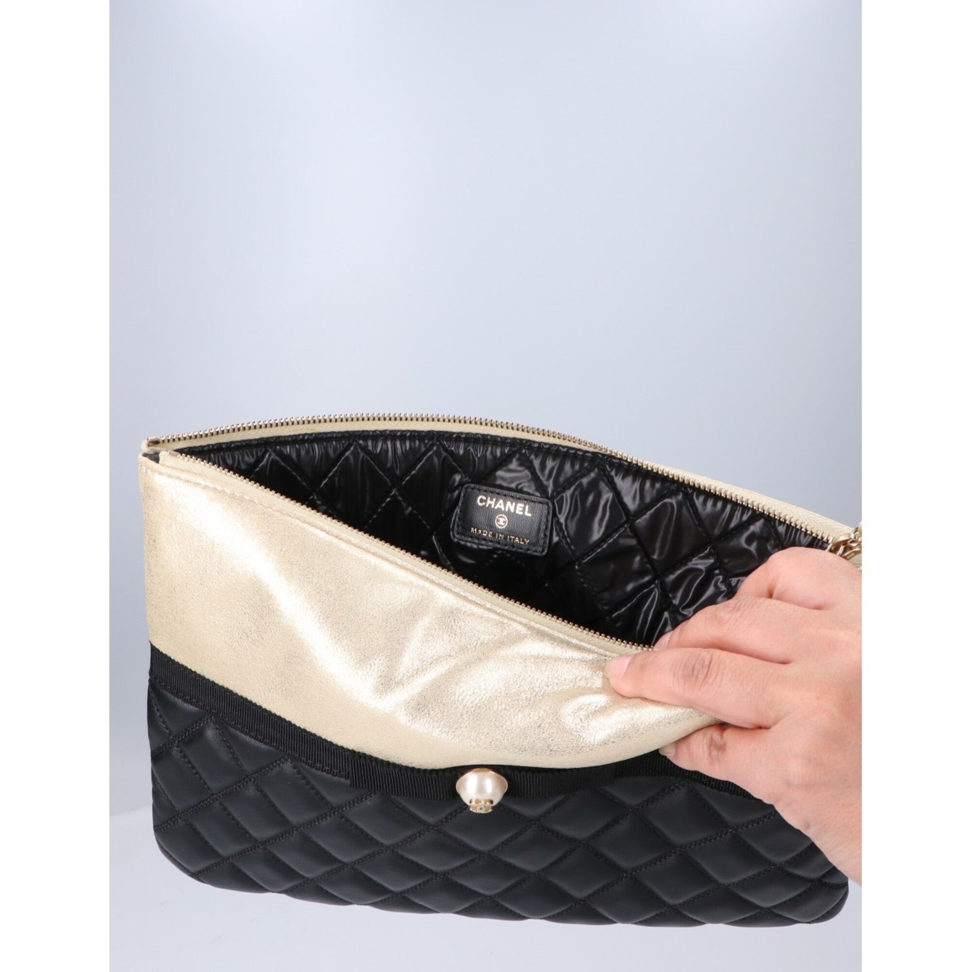 Chanel Black Champagne Gold Leather Clutch Bag (Pre-Owned)