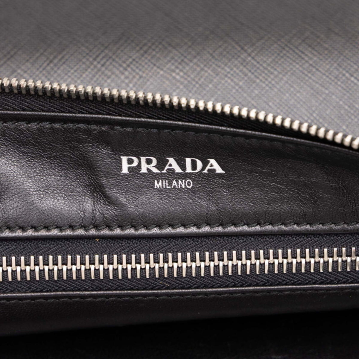 Prada Black Saffiano Triangle Leather Clutch Bag (Pre-Owned)