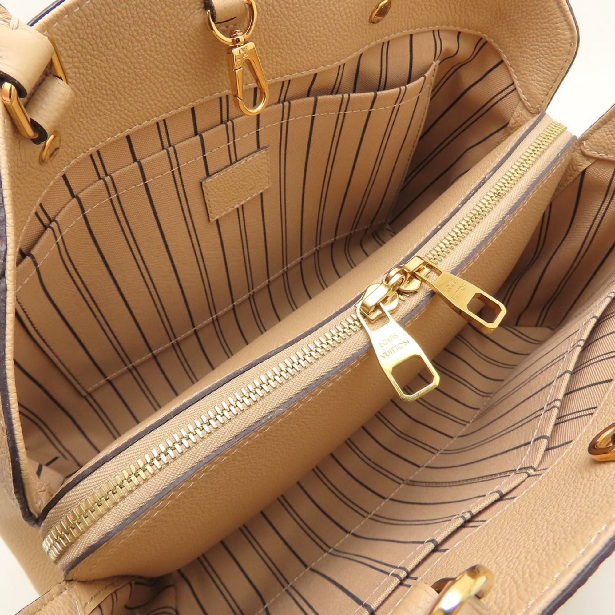 Louis Vuitton Dune Leather Handbag (Pre-Owned)