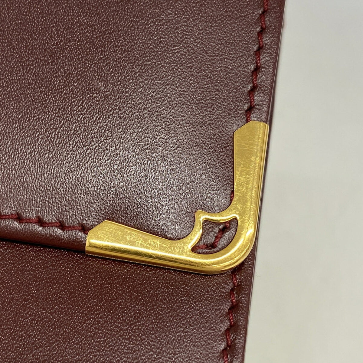 Cartier Bordeaux Leather Clutch Bag (Pre-Owned)