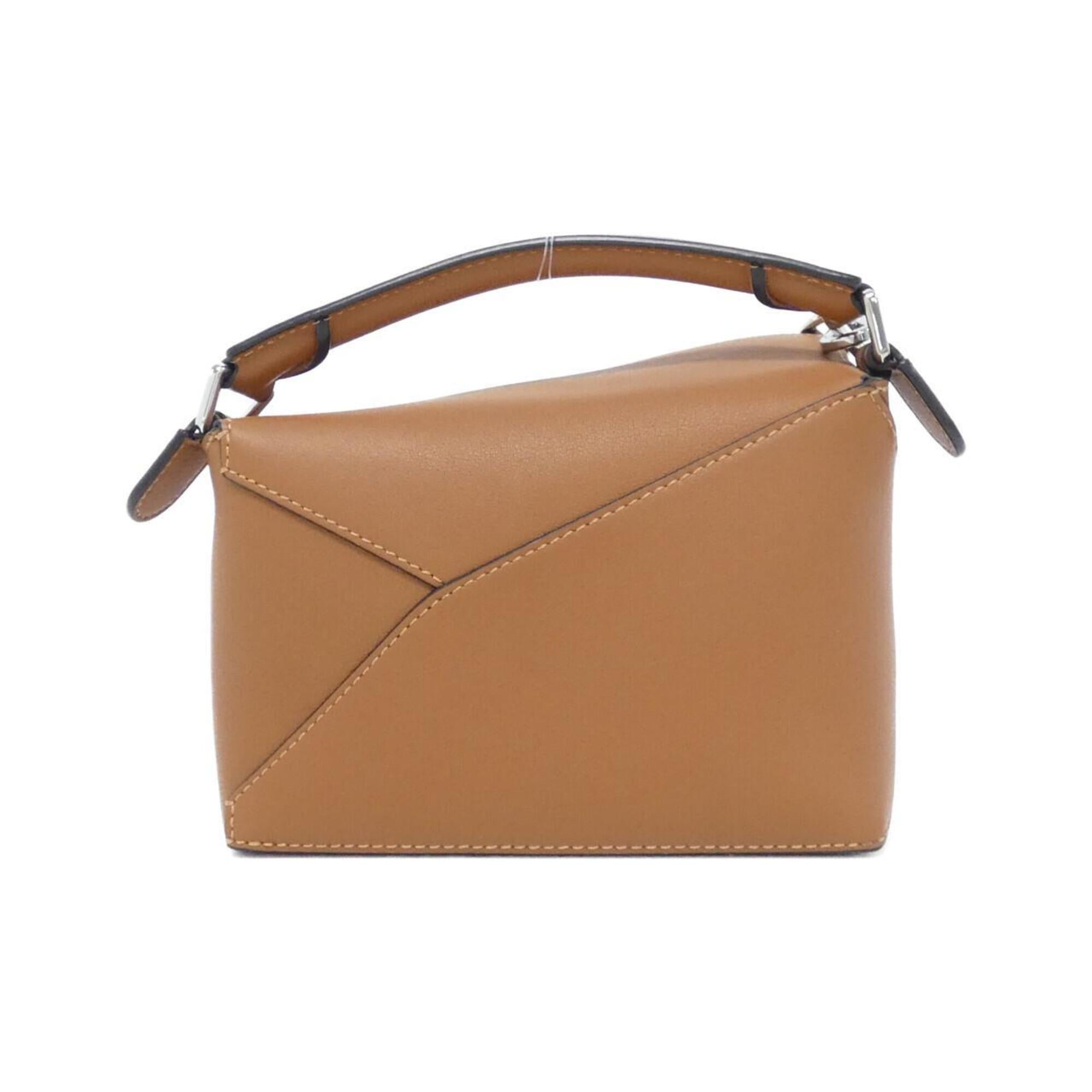 Loewe Puzzle Silver Leather Handbag (Pre-Owned)