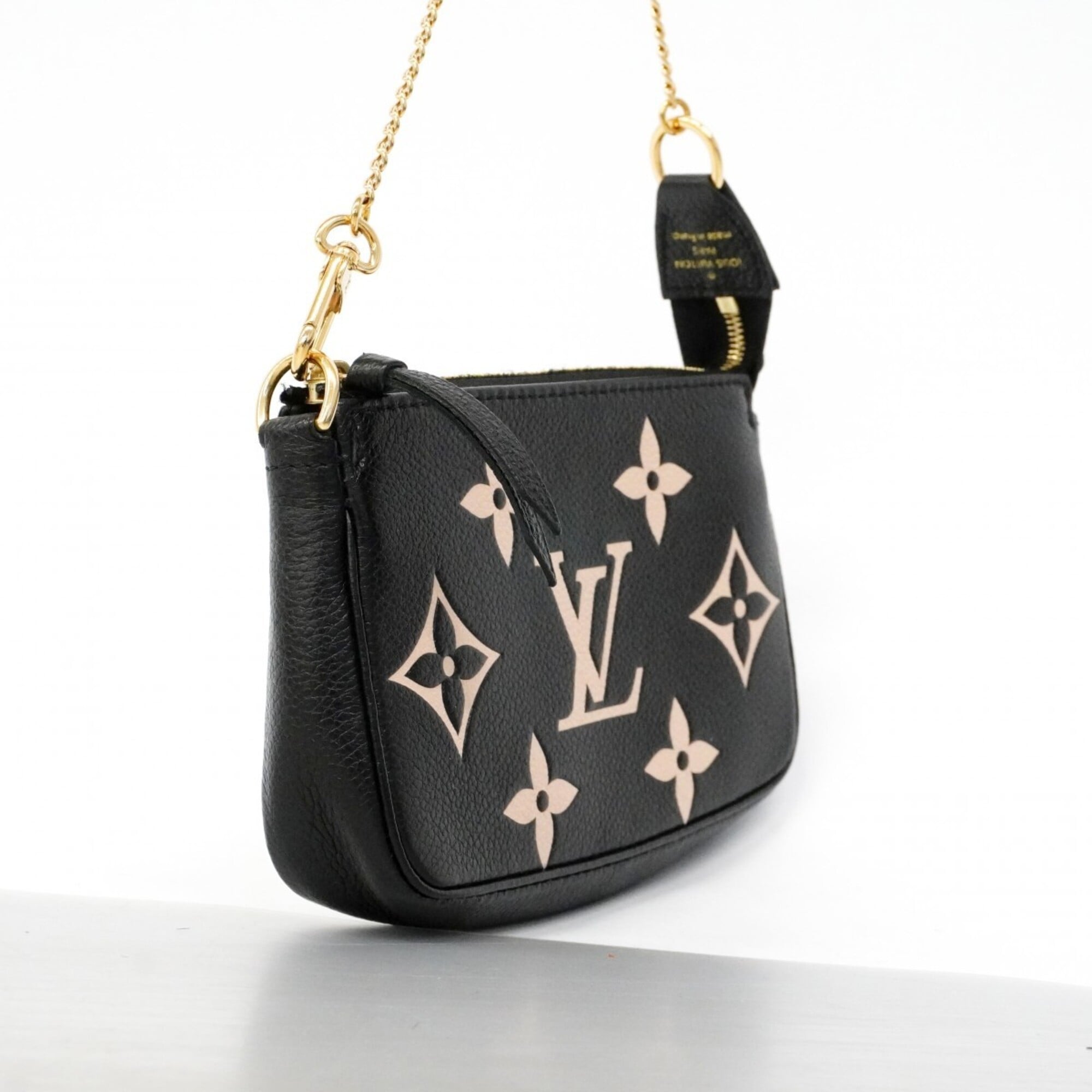 Louis Vuitton Cream Noir Pouch (Pre-Owned)
