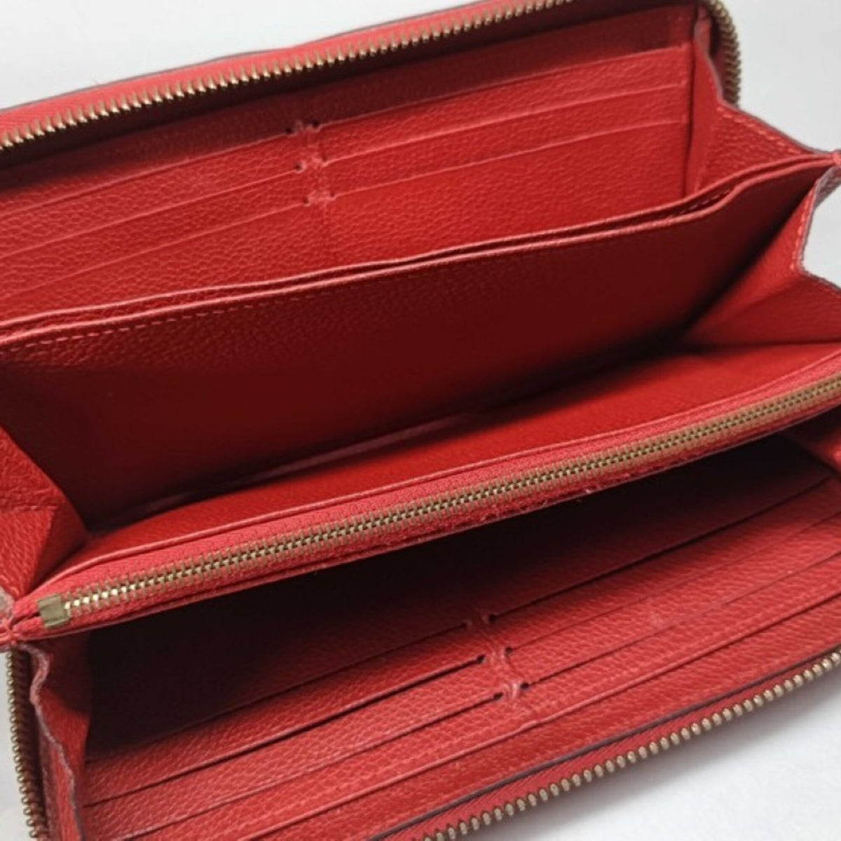 Louis Vuitton Monogram Empreinte Cerise Red Color Monogram Empreinte Long Wallet (Bi-Fold) (Pre-Owned)