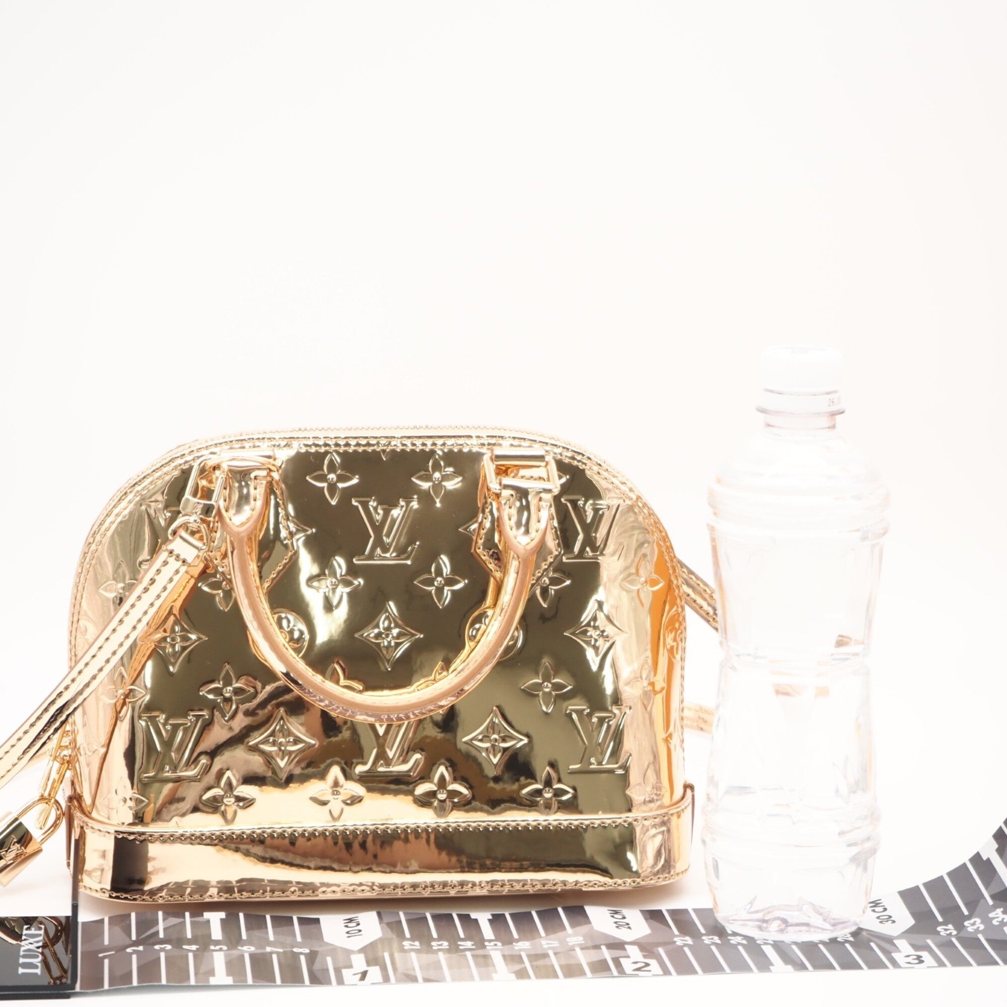 Louis Vuitton Bronze Coated Canvas Handbag (Pre-Owned)