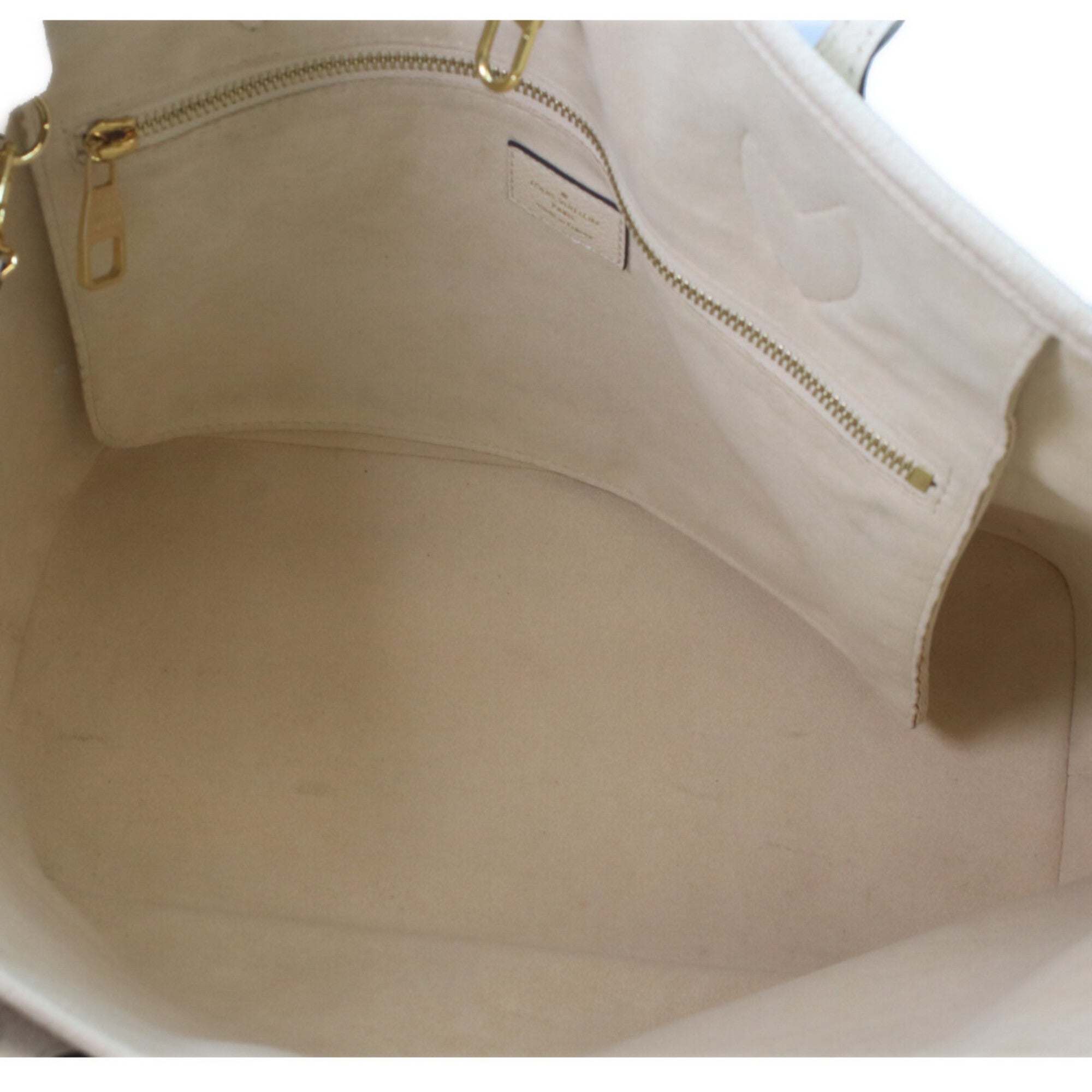 Louis Vuitton Ivory Monogram Empreinte Pouch Tote Bag (Pre-Owned)