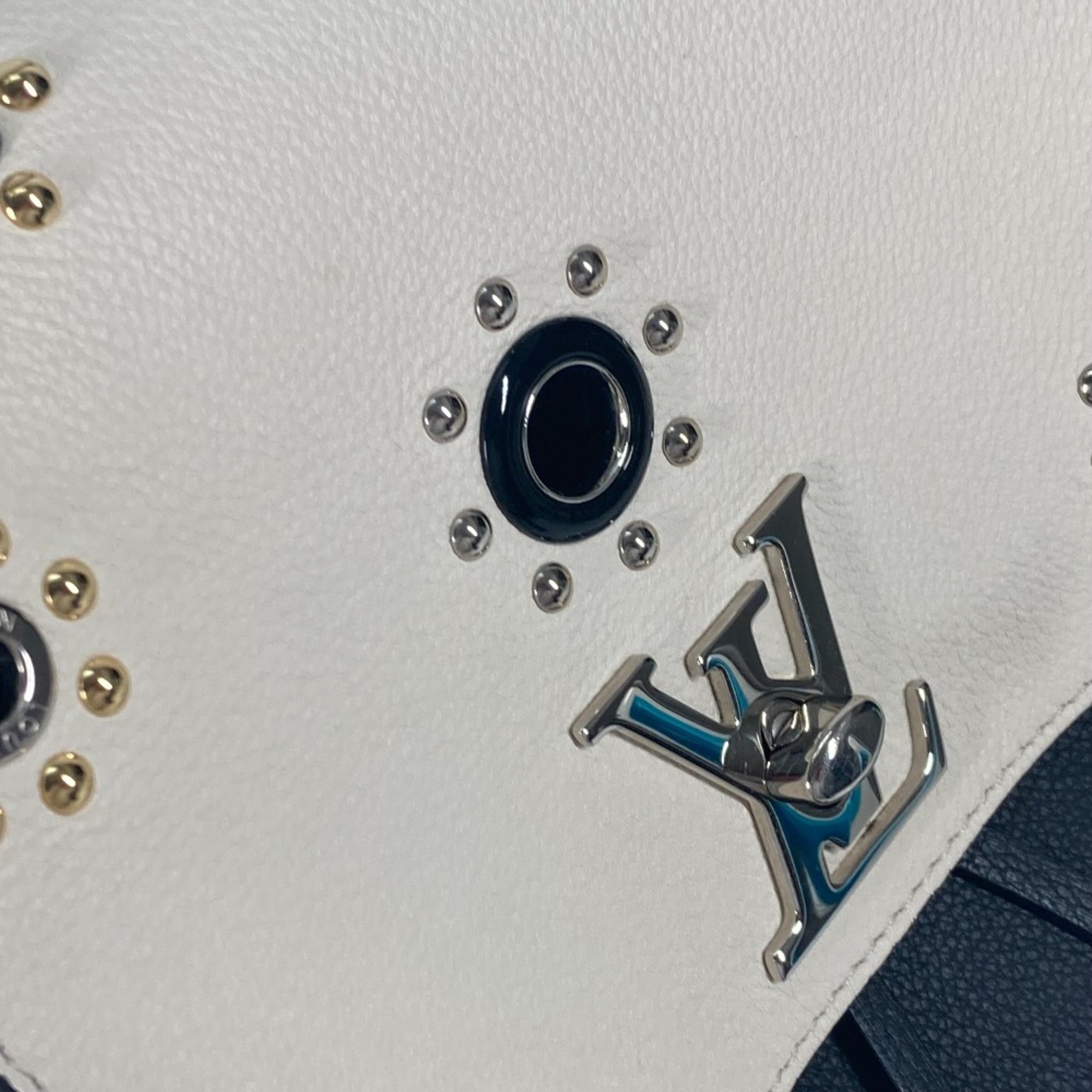 Louis Vuitton Black White Leather Backpack (Pre-Owned)
