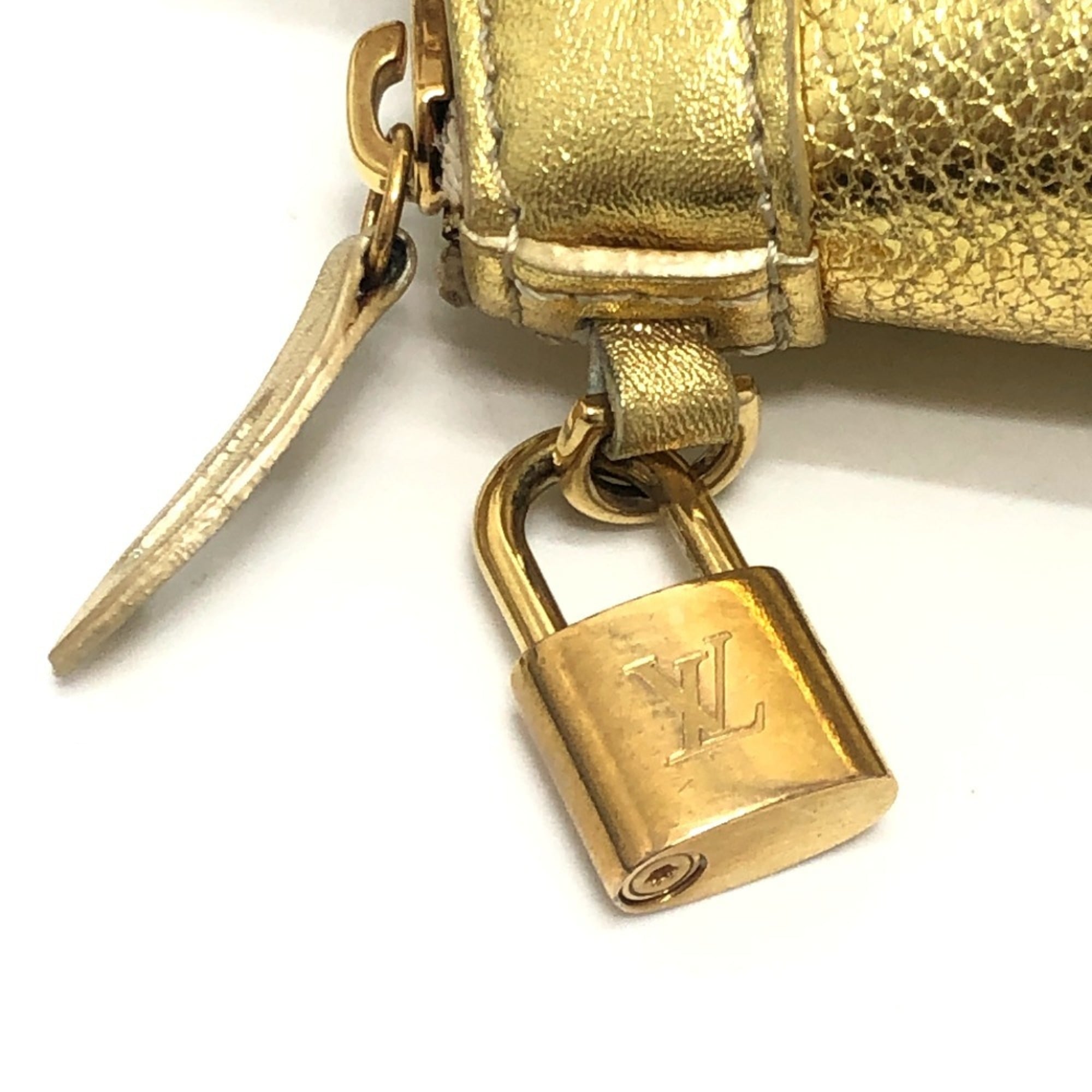 Louis Vuitton Gold Suhali Leather Handbag Pouch (Pre-Owned)