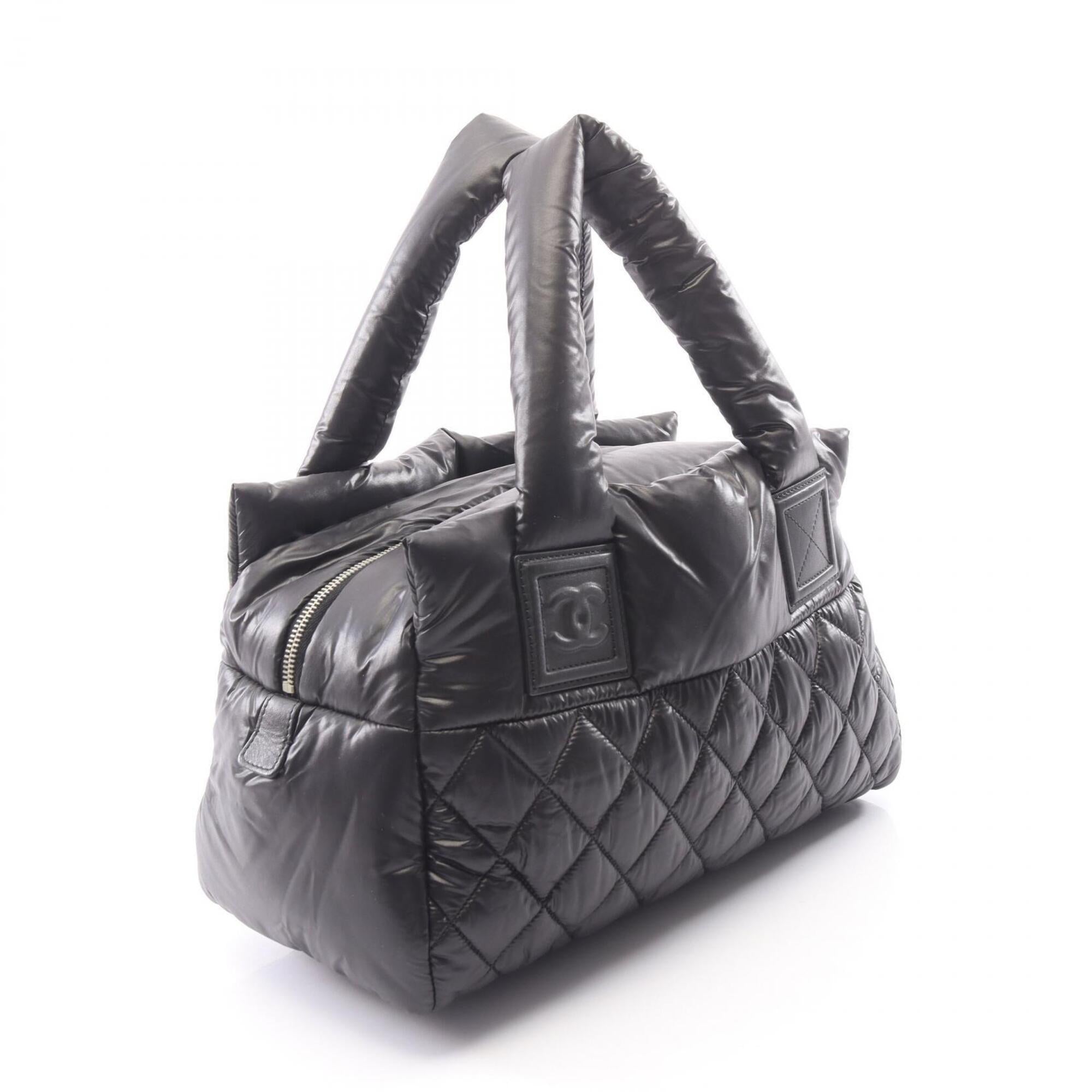 Chanel Black Nylon Leather Handbag (Pre-Owned)