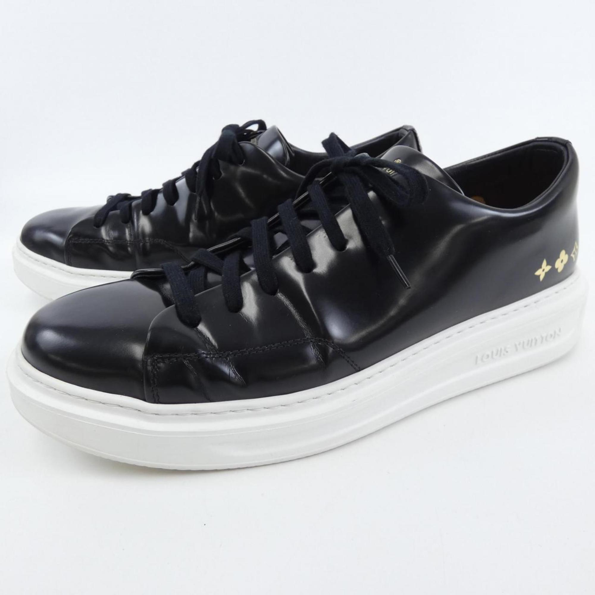 Louis Vuitton Black White Sneakers (Pre-Owned)