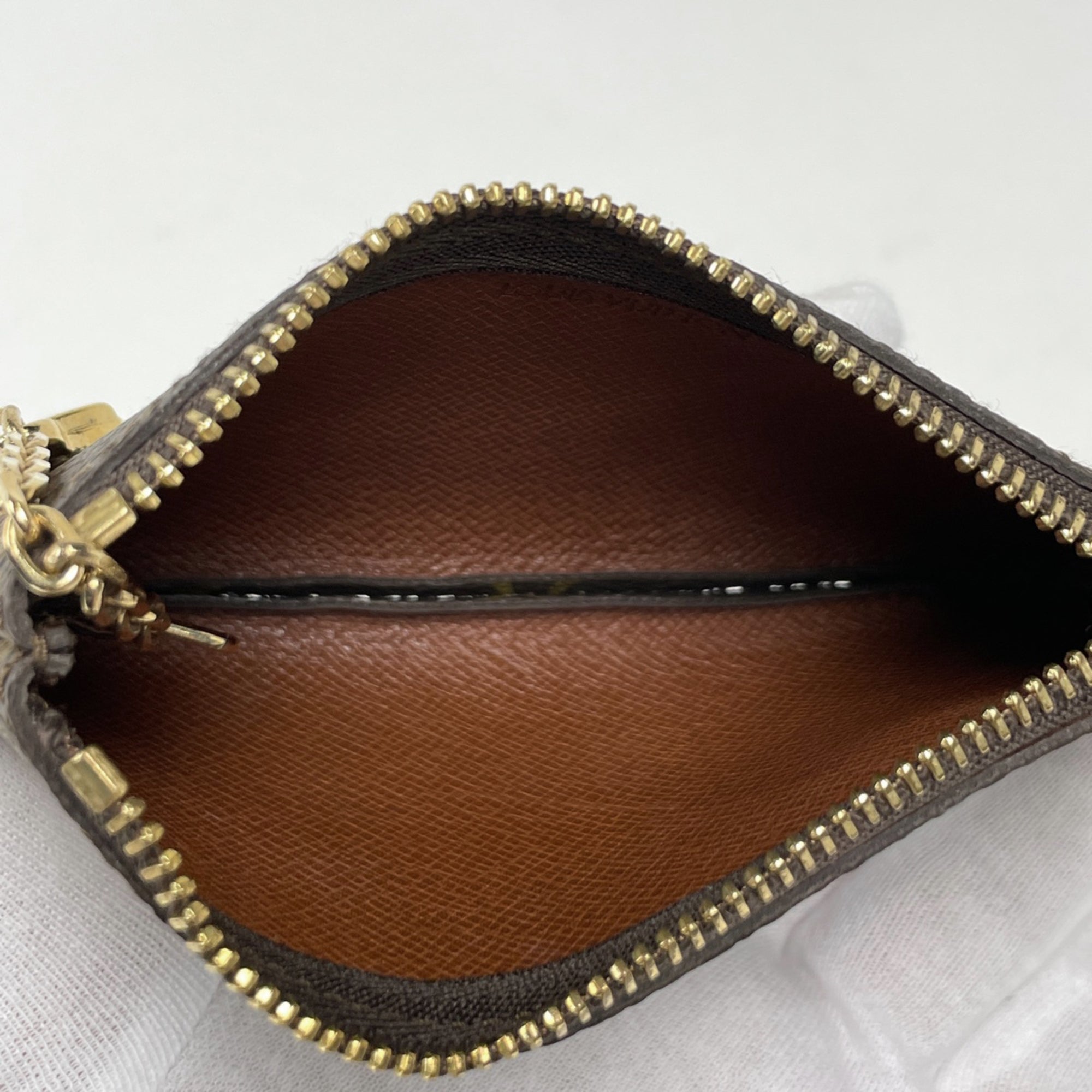 Louis Vuitton Brown Monogram Coin Purse/Coin Case (Pre-Owned)