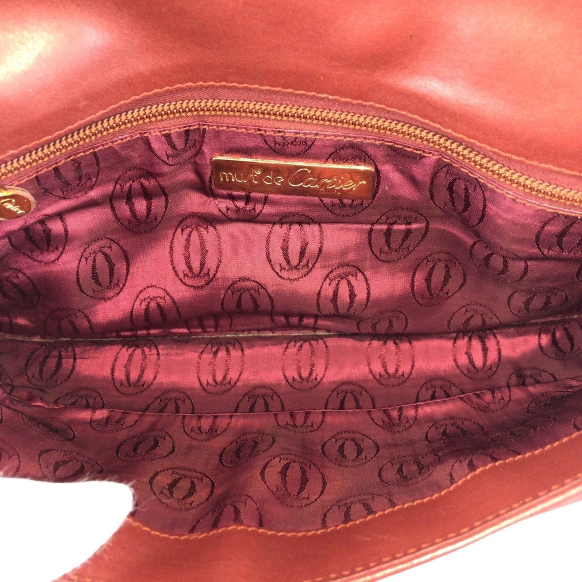 Cartier Bordeaux Wine Red Leather Clutch Bag (Pre-Owned)