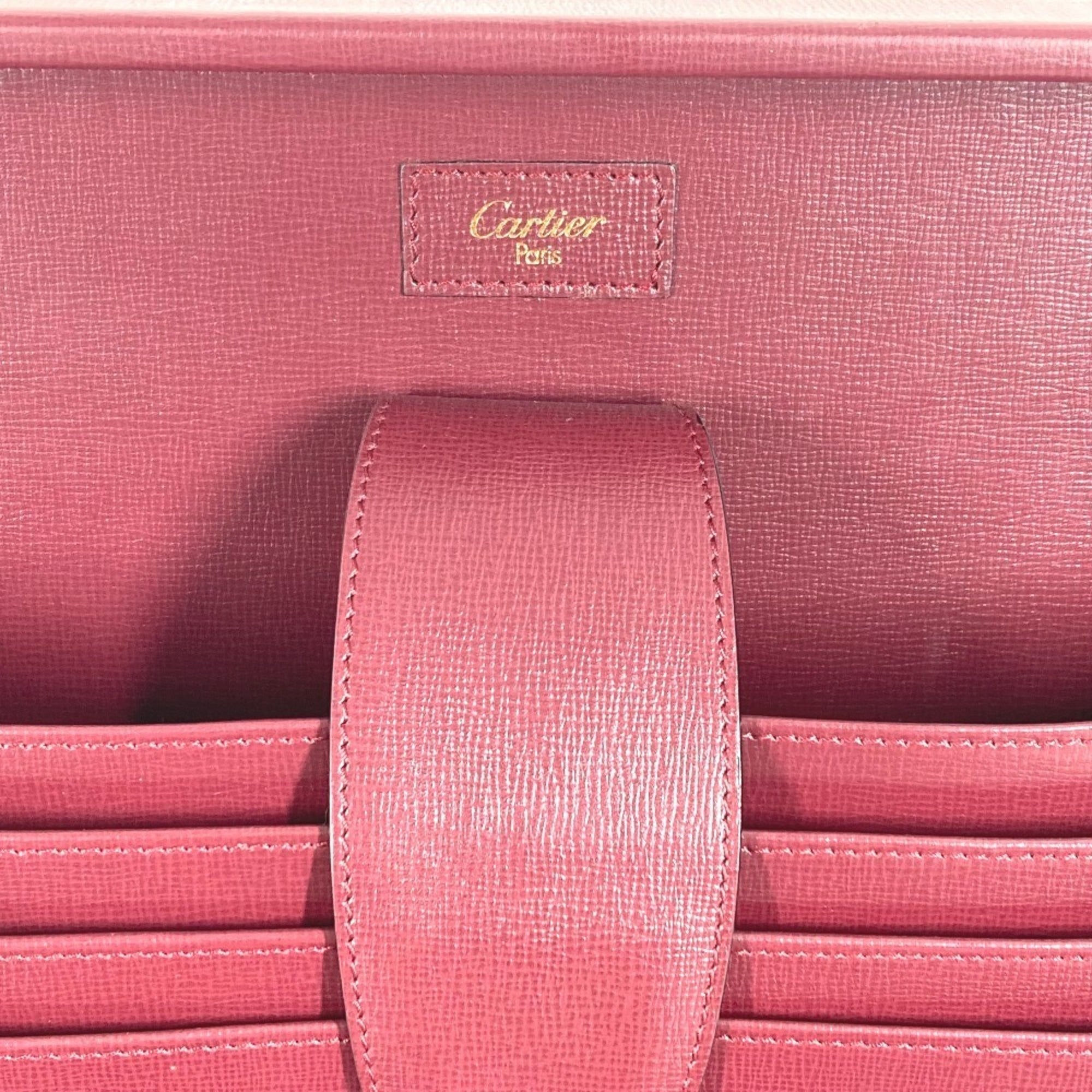Cartier Wine Red Leather Handbag (Pre-Owned)